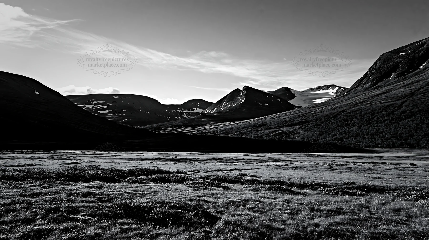 Sunbeams over Jotunheimen valley meadow in black and white - AI-generated stock image
