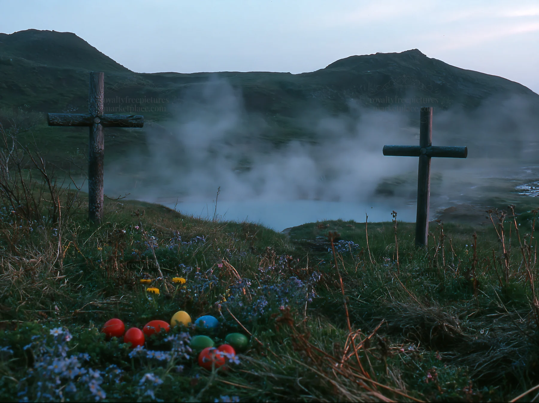 Christian crosses near geothermal spring meadow in twilight - AI-generated stock image