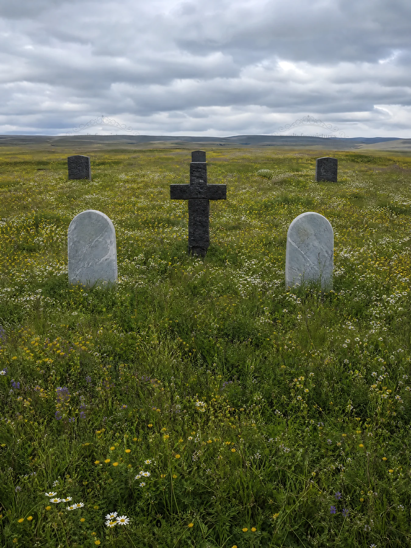 Dark Christian cross in summer meadow with gravestones - AI-generated stock image