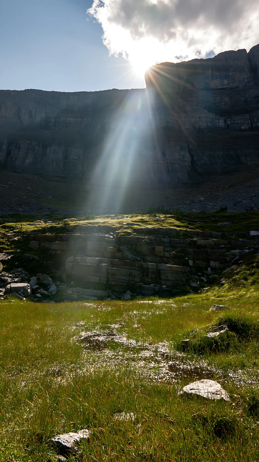 Light rays shine down on Sunshine Meadows in Banff - AI-generated stock image
