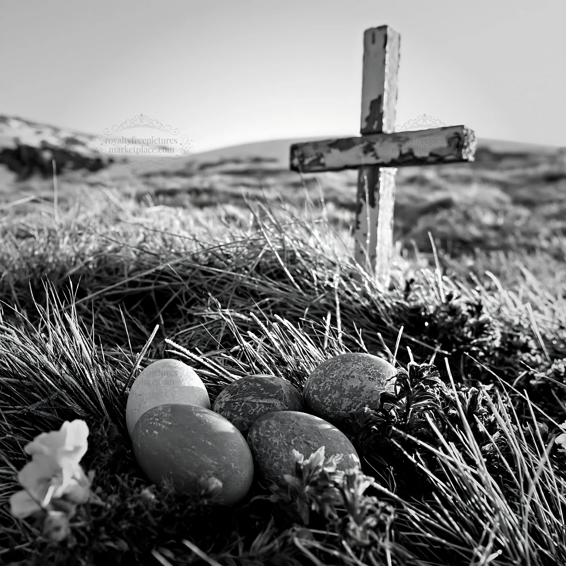 Whitewashed Christian cross in a winter meadow with colored eggs - AI-generated stock image