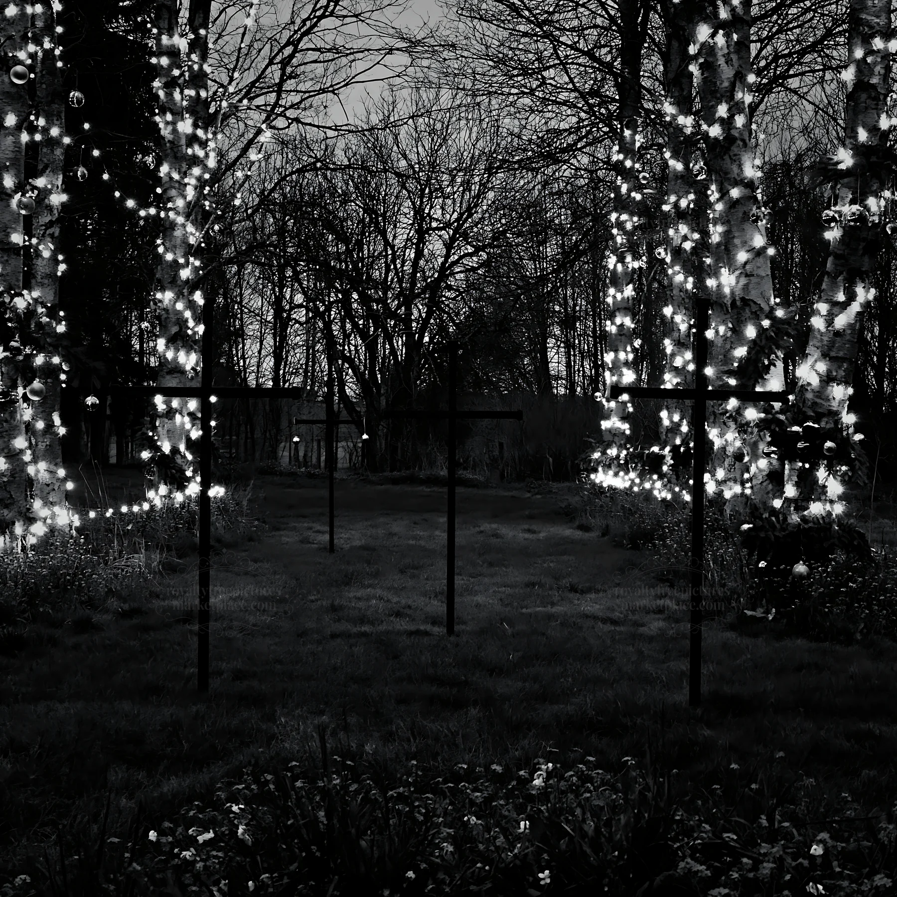 Three iron crosses in the Advent meadow at dusk - AI-generated stock image