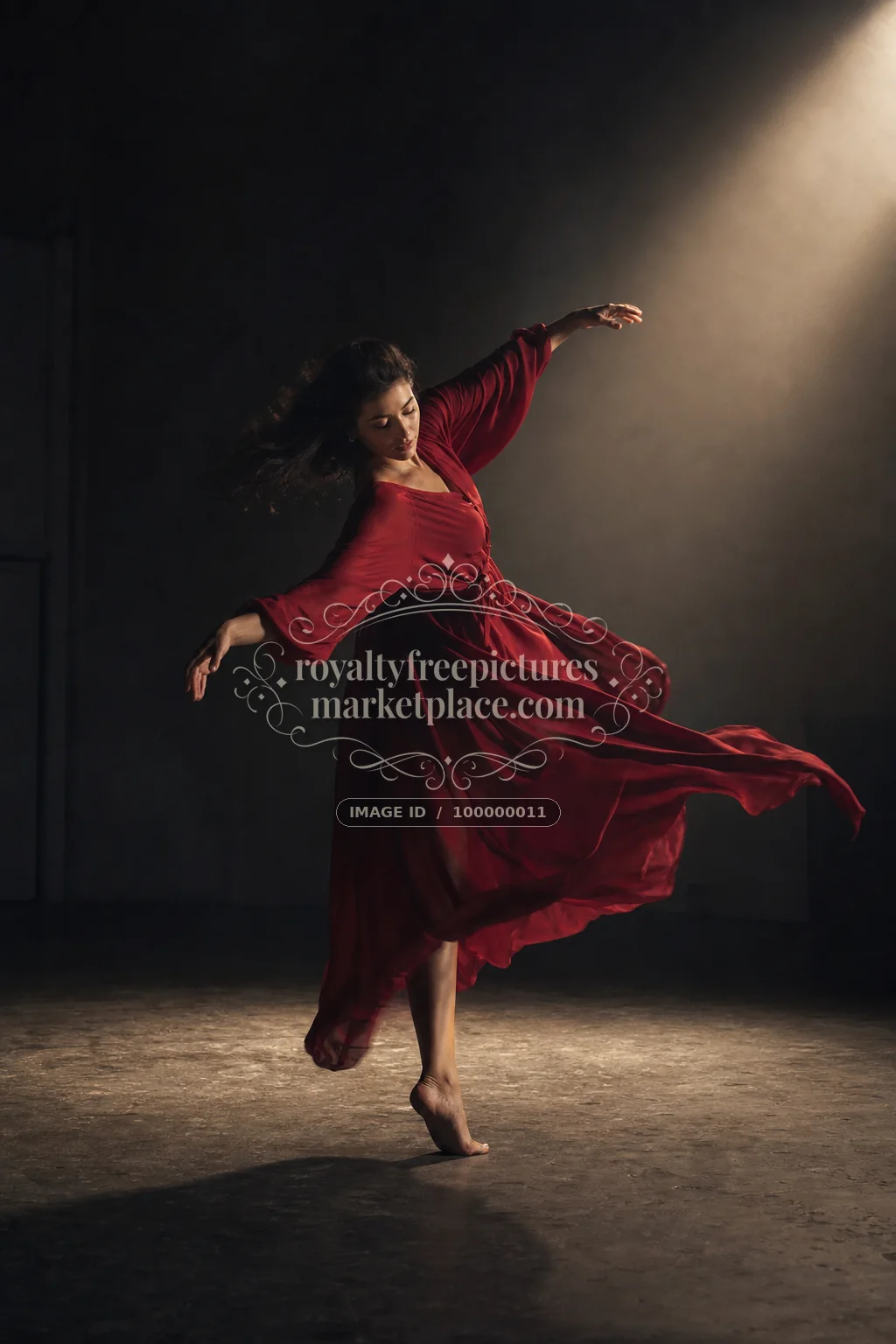 Crimson Dancer in a Shaft of Light