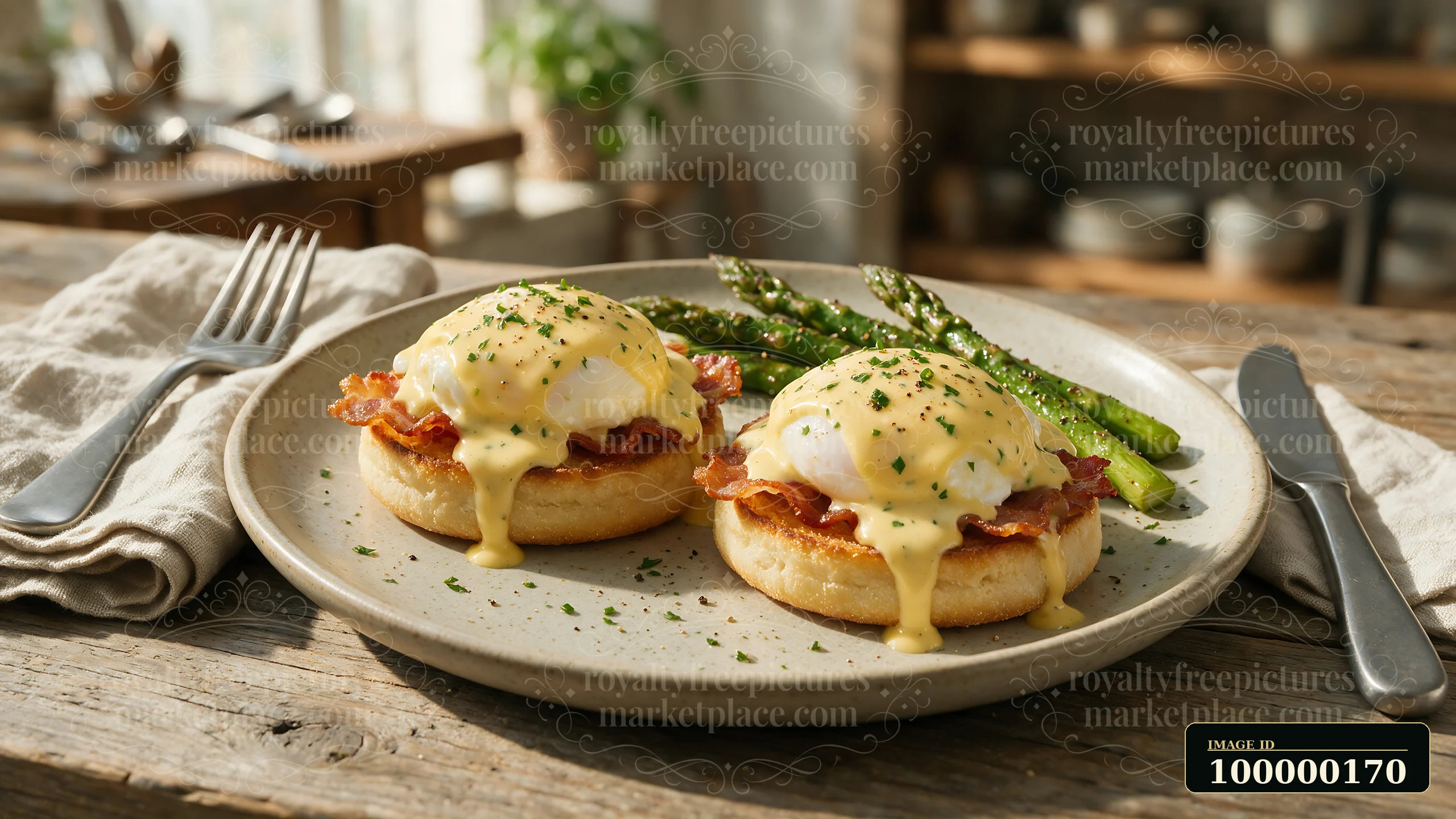 Poached eggs with hollandaise, bacon, English muffins, and asparagus on a breakfast plate.