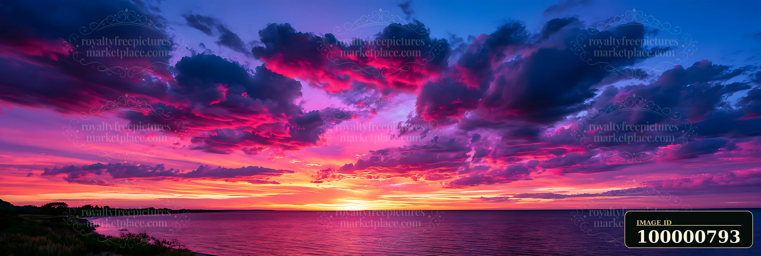 A sunset fills the sky with colors as the sun dips below the horizon over the ocean.