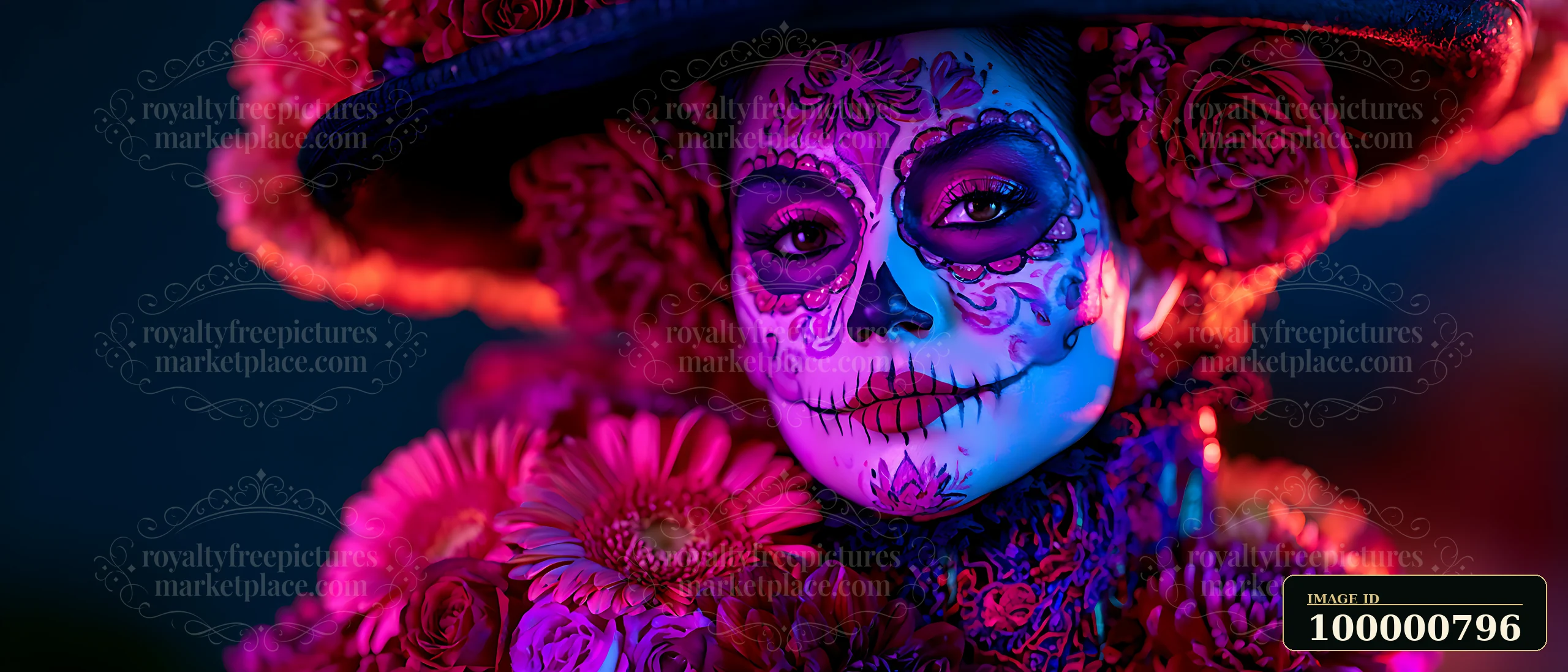 A person displays intricate skull makeup and floral decorations, celebrating a cultural event.