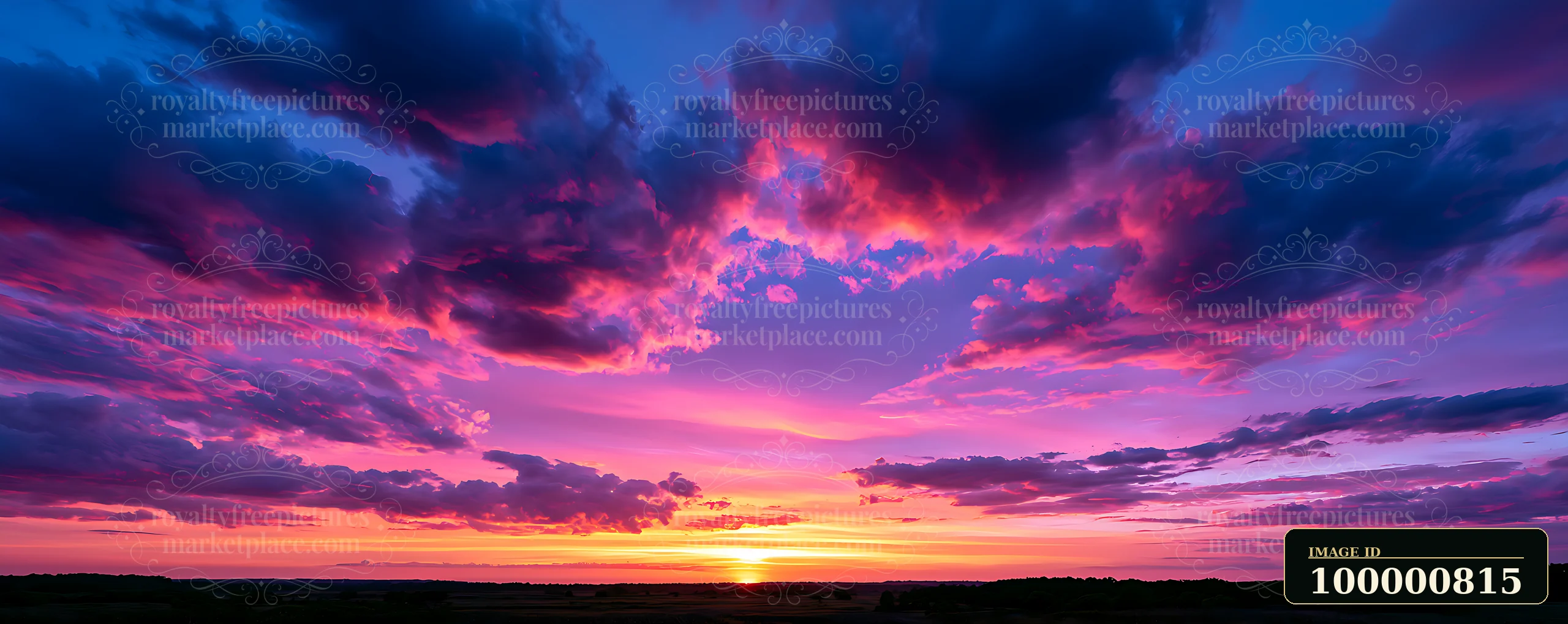 A sunset displays vibrant colors across the sky, with pink and purple hues blending together as the sun sets on the horizon.