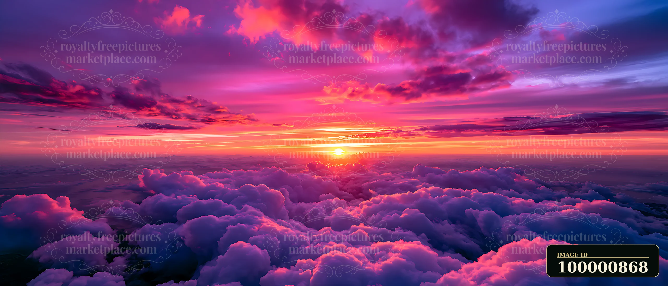 A colorful sunset fills the sky with pink and purple hues as the sun sets behind fluffy clouds.