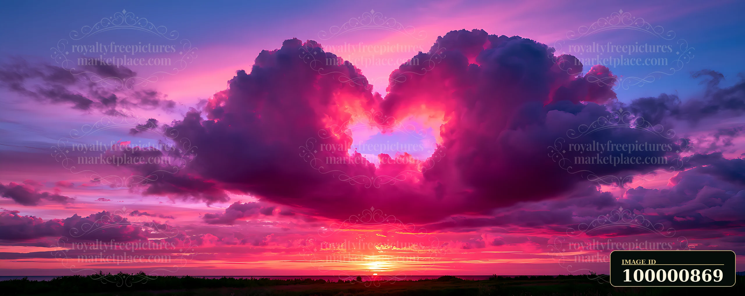 A heart-shaped cloud formation appears in a vibrant sky at sunset, with shades of pink and purple enhancing the beauty of the scene.
