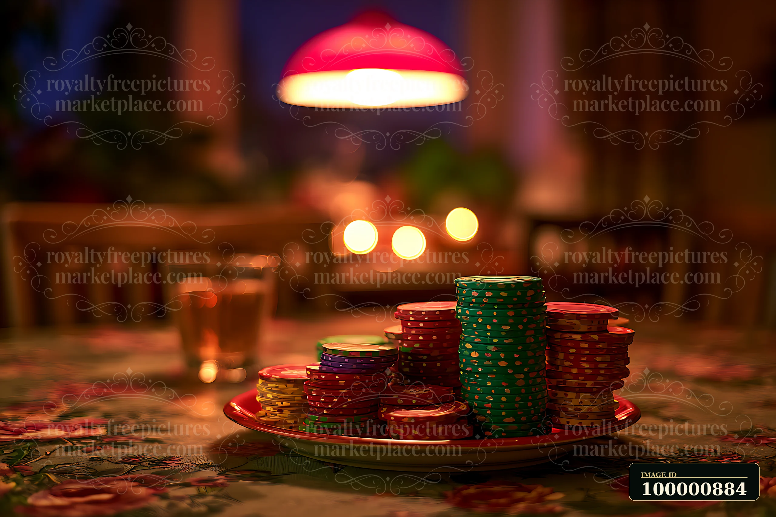 A stack of colorful poker chips sits on a plate next to two glasses.