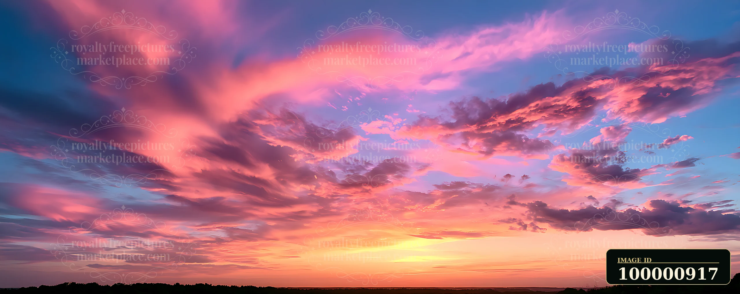 The sky shows a mix of pink, purple, and blue clouds as the sun sets, creating a vibrant scene.