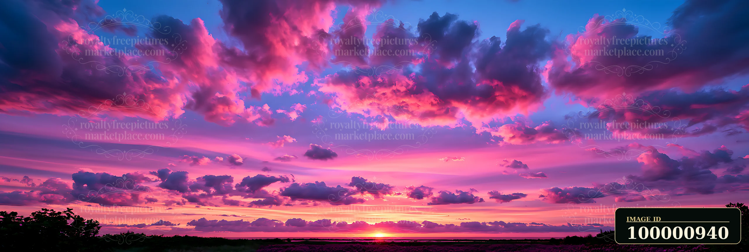 The sky displays a vivid sunset with shades of pink, purple, and blue clouds.