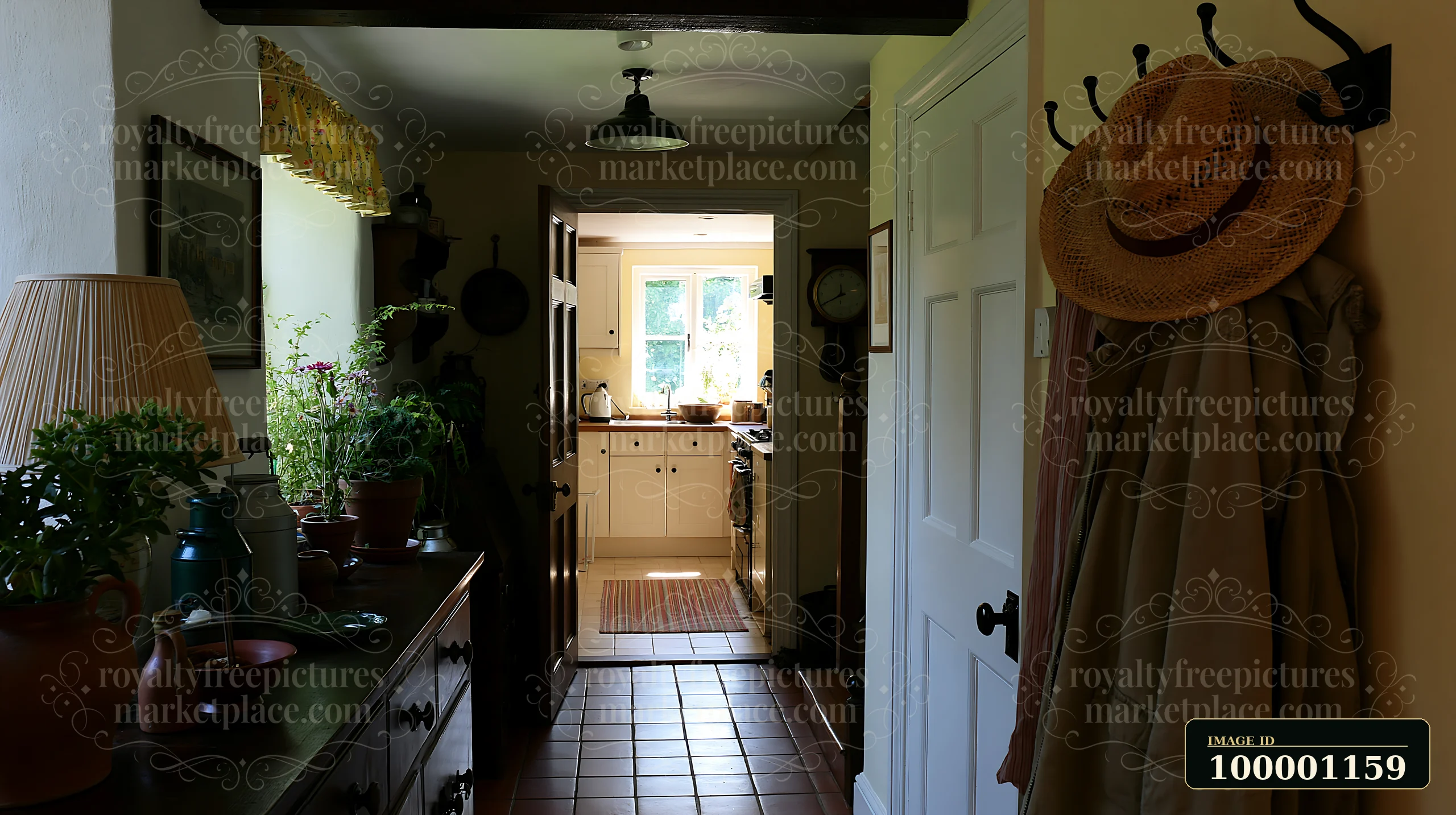 This hallway features coat hooks and leads to a bright kitchen area.