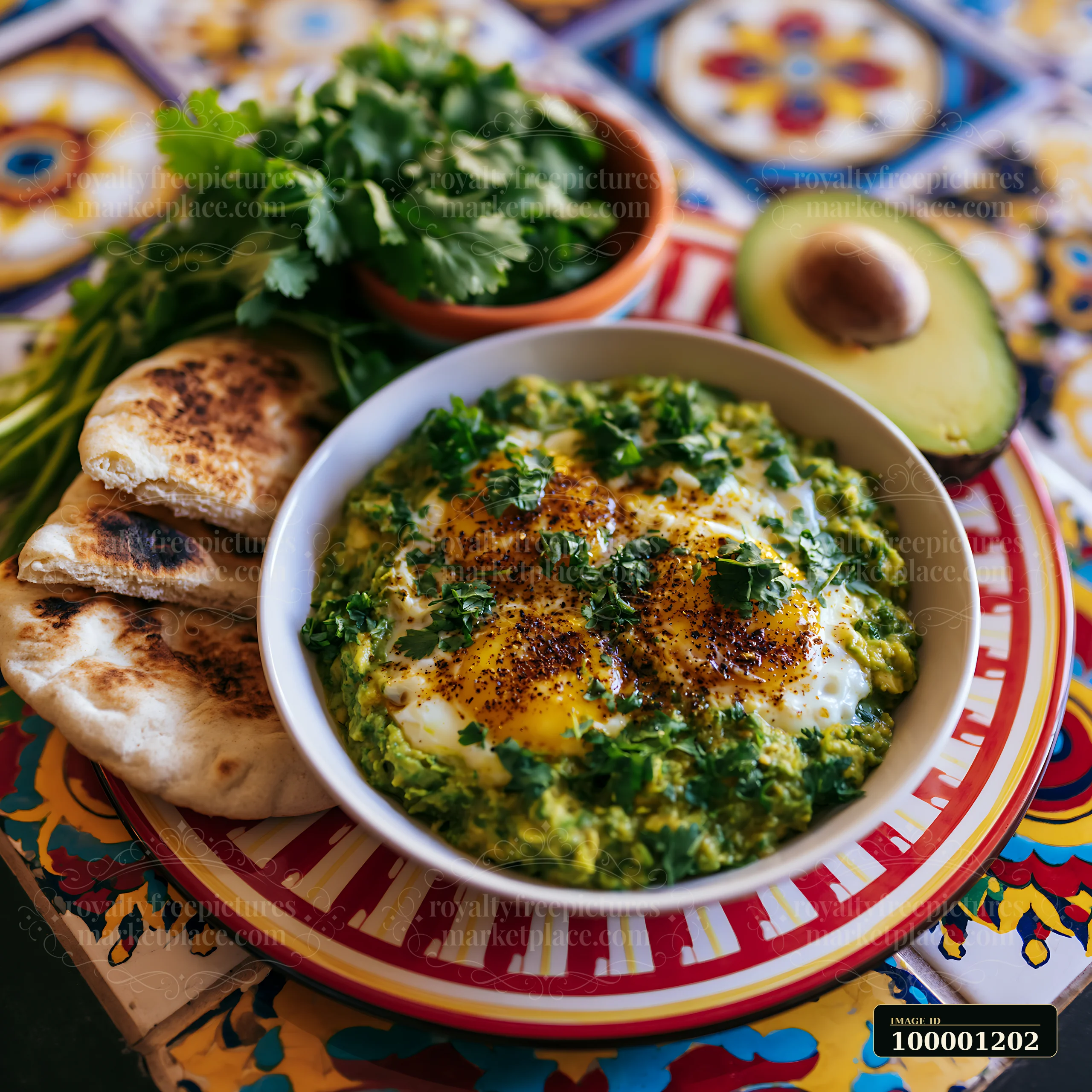 A spring breakfast plate features eggs cooked in avocado, served with fresh herbs and pita bread.