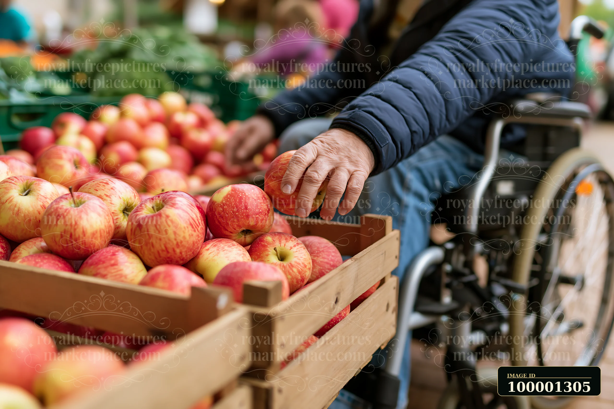 A person with muscular dystrophy using a wheelchair selects apples from a display at a market.