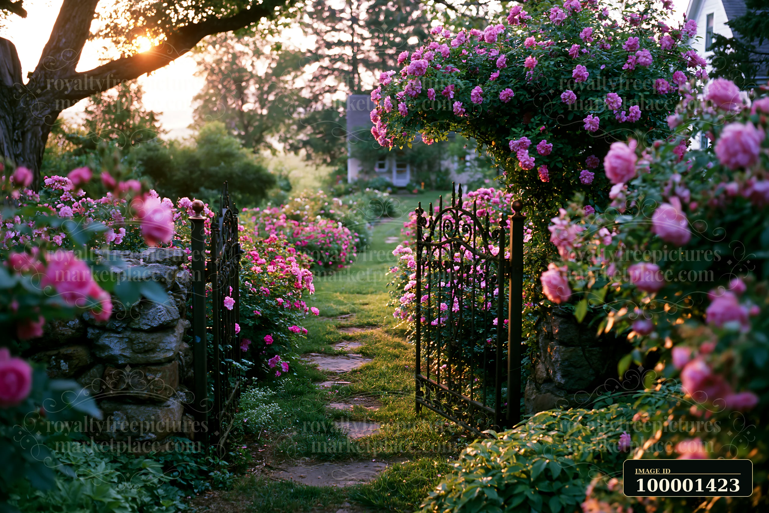 A garden path leads through lush greenery, framed by blooming roses and a wrought iron gate.