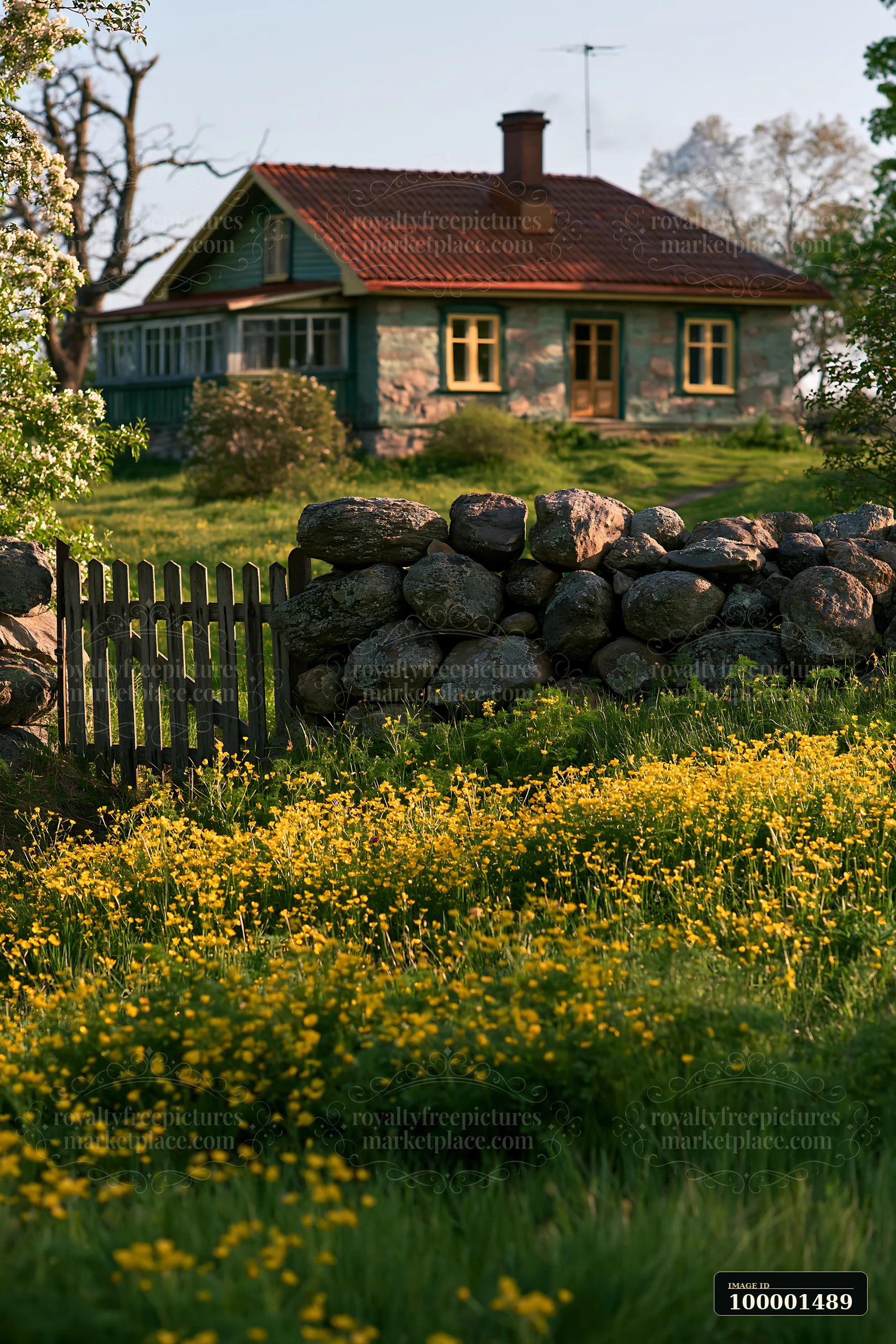 A rural cottage with chimney smoke rises from the roof, set in a green landscape.