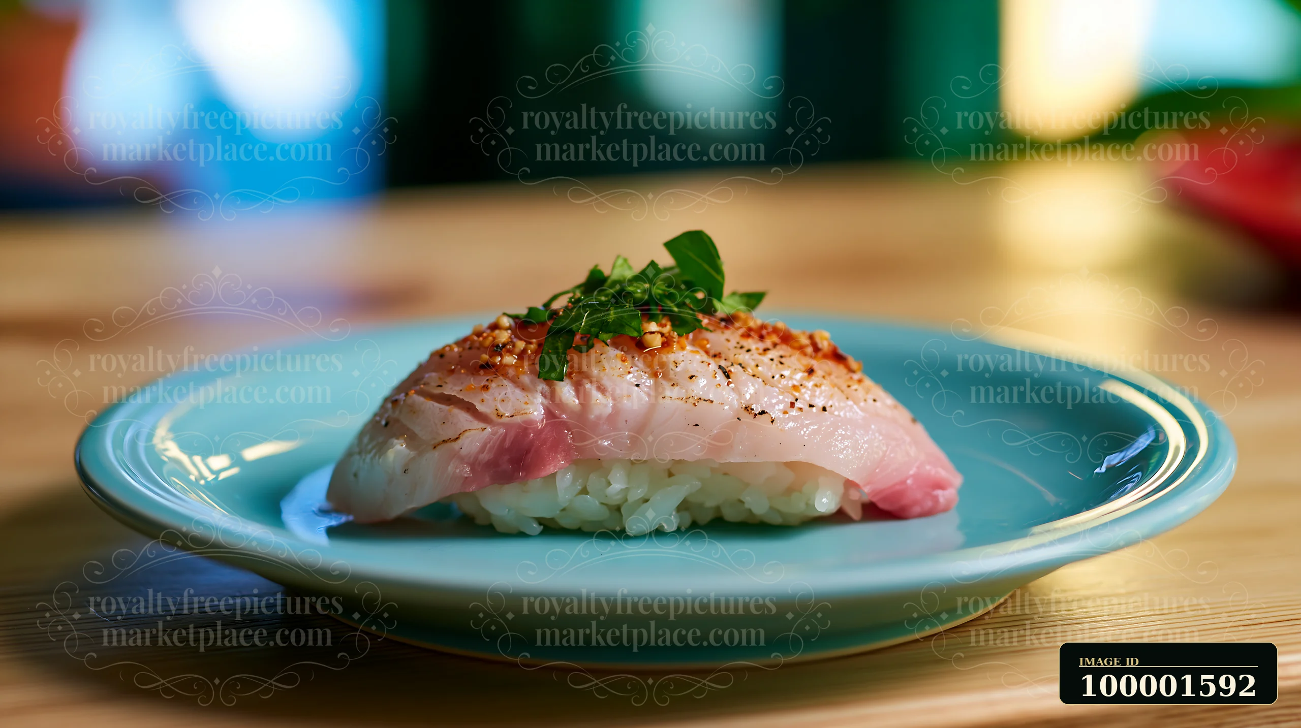 One sushi piece with fresh herb garnish sits neatly on a blue plate.