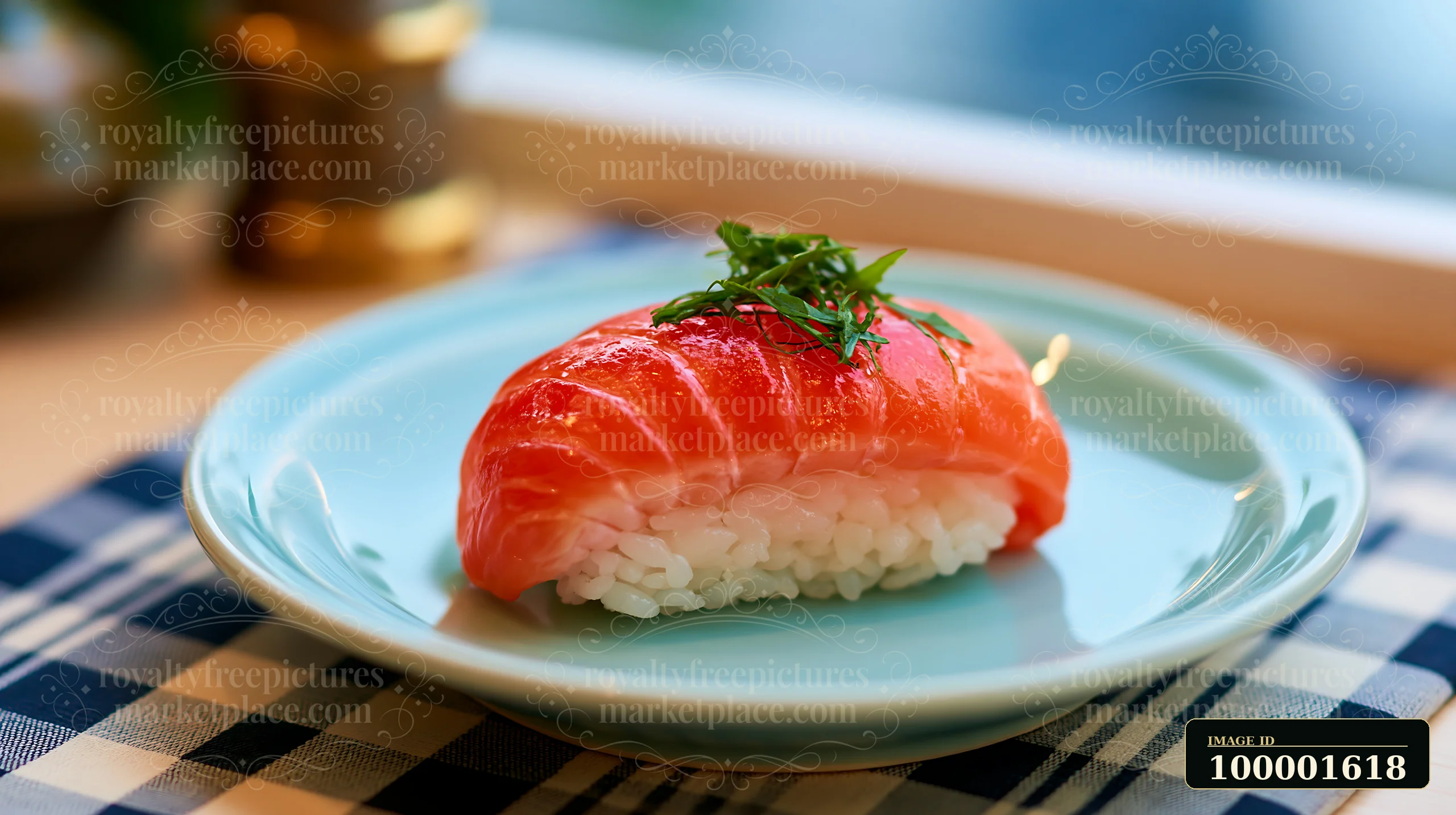 A single sushi piece with fresh herb garnish sits on a blue plate against a checkered backdrop.