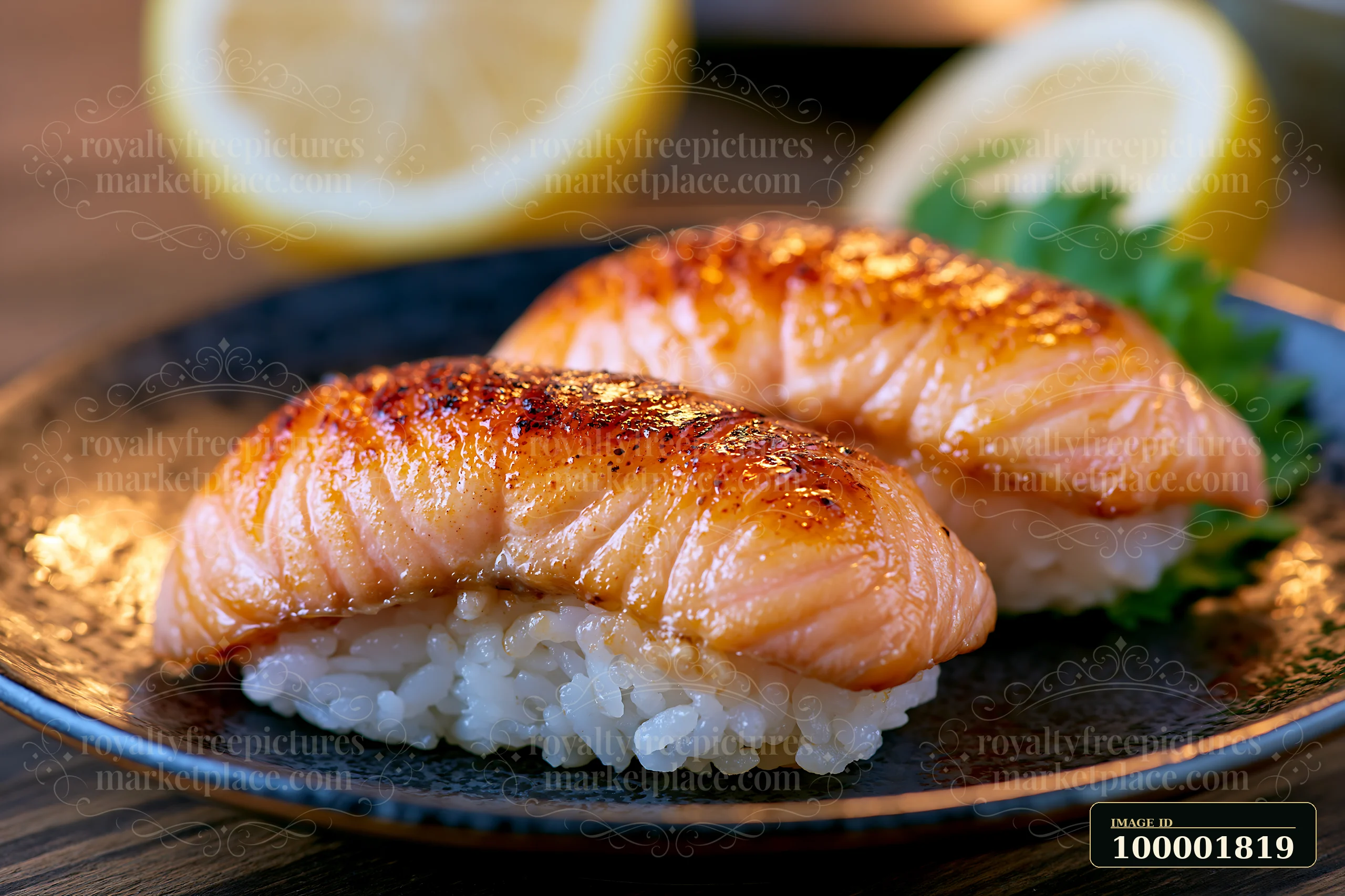 Sushi with lemon garnish close-up features two pieces of salmon nigiri resting on a dark plate.