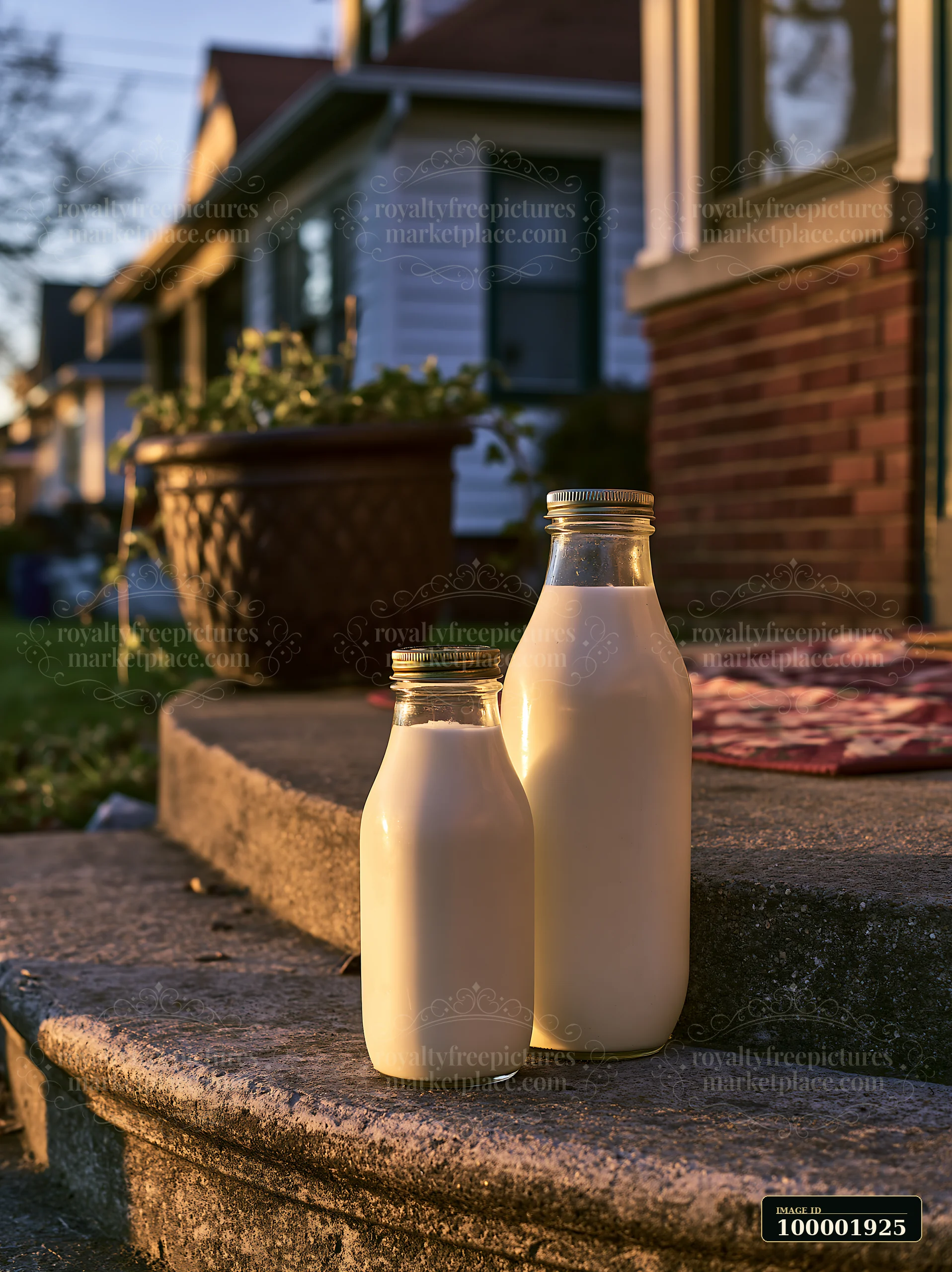 Two glass milk bottles sit on a stone doorstep as the sun rises, casting warm light on the scene.