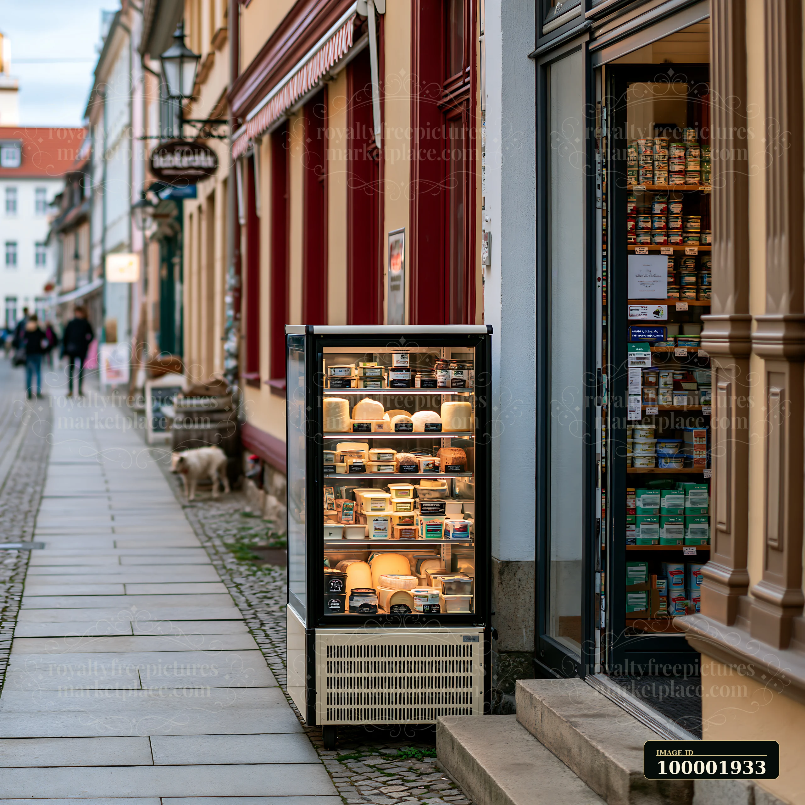 A dairy products shop on a pedestrian street features a glass display case showcasing various cheeses.