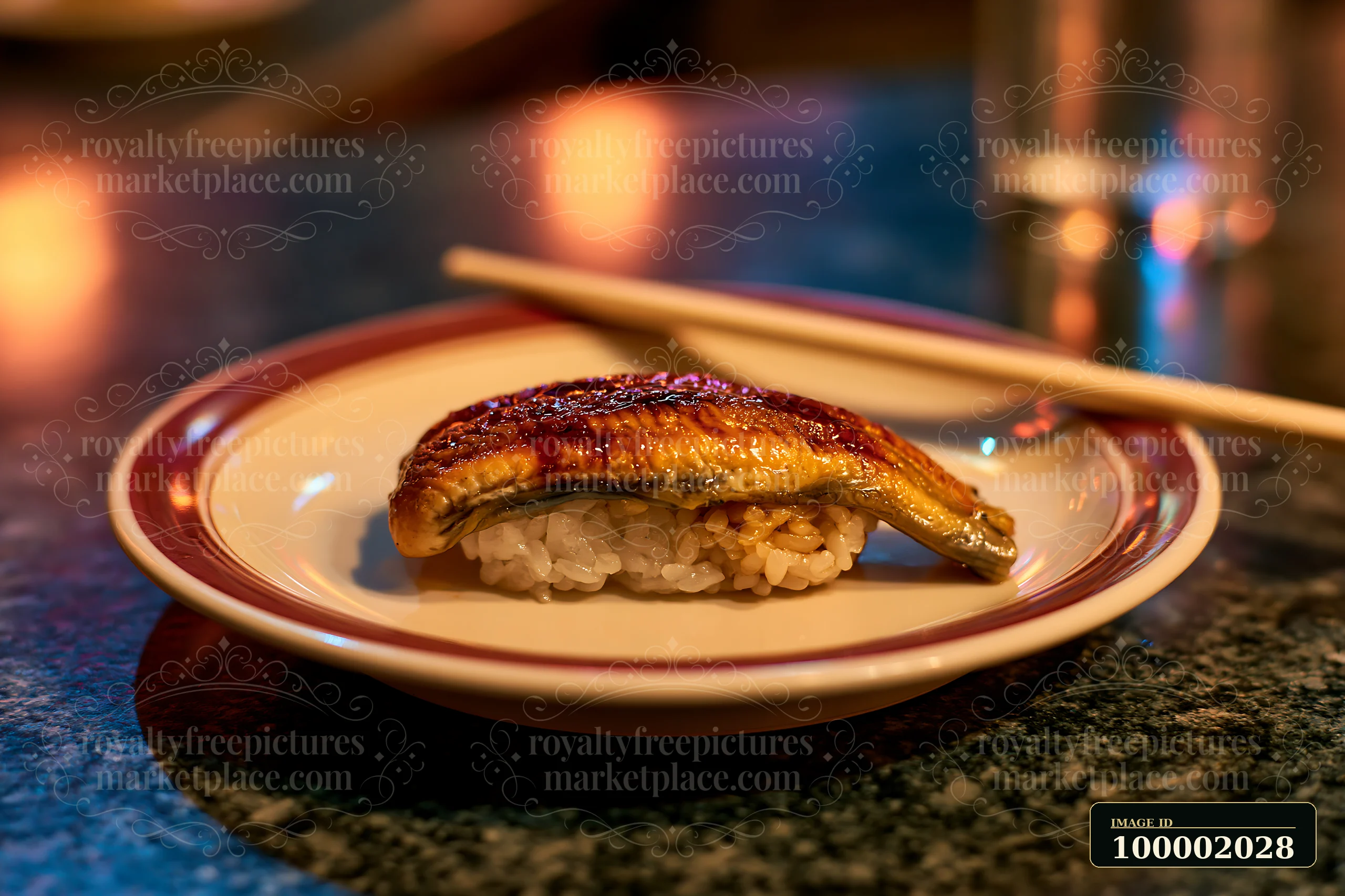 A single piece of sushi rests on a plate.