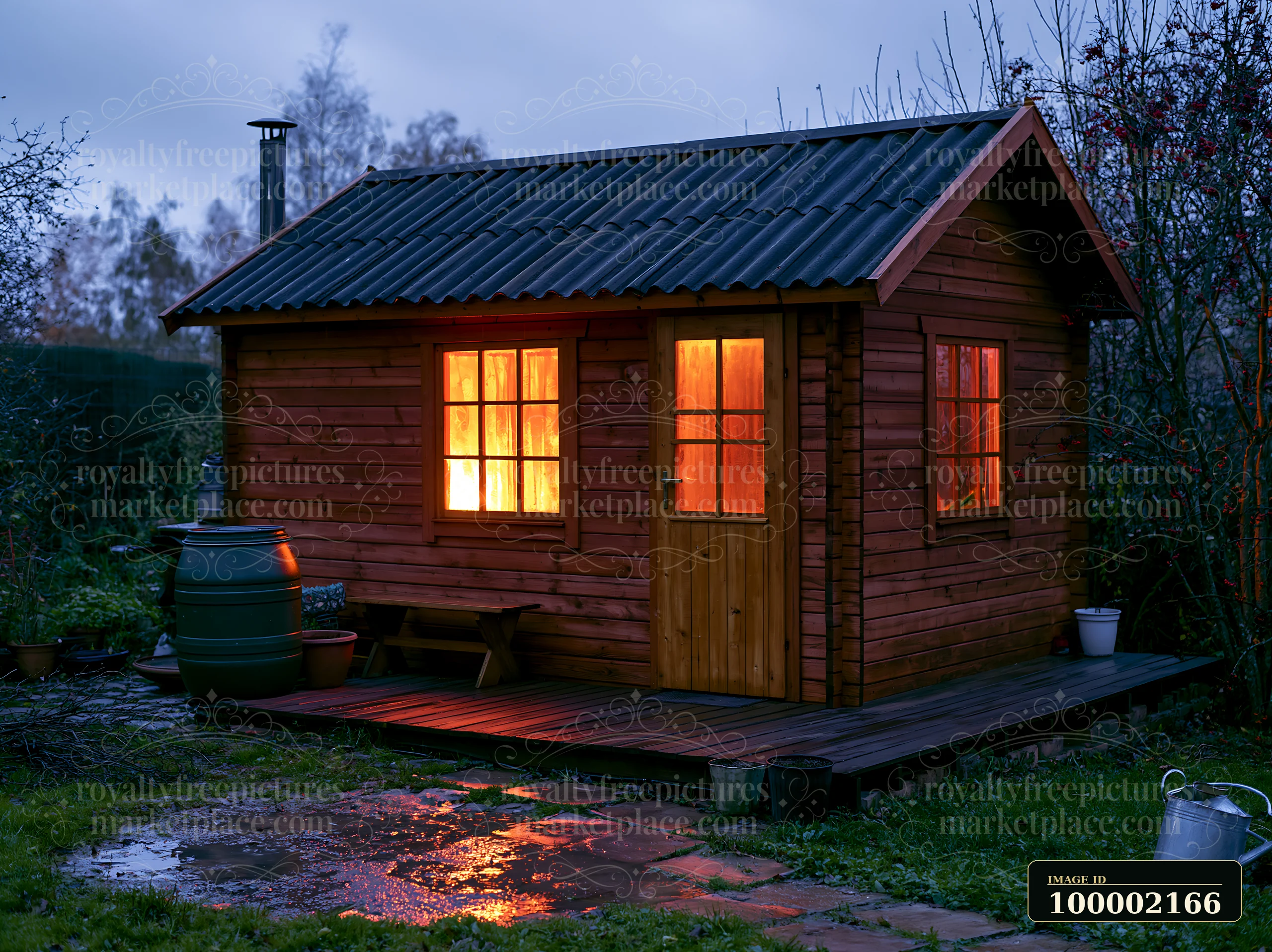 An empty wooden garden house stands in a garden surrounded by wet ground.