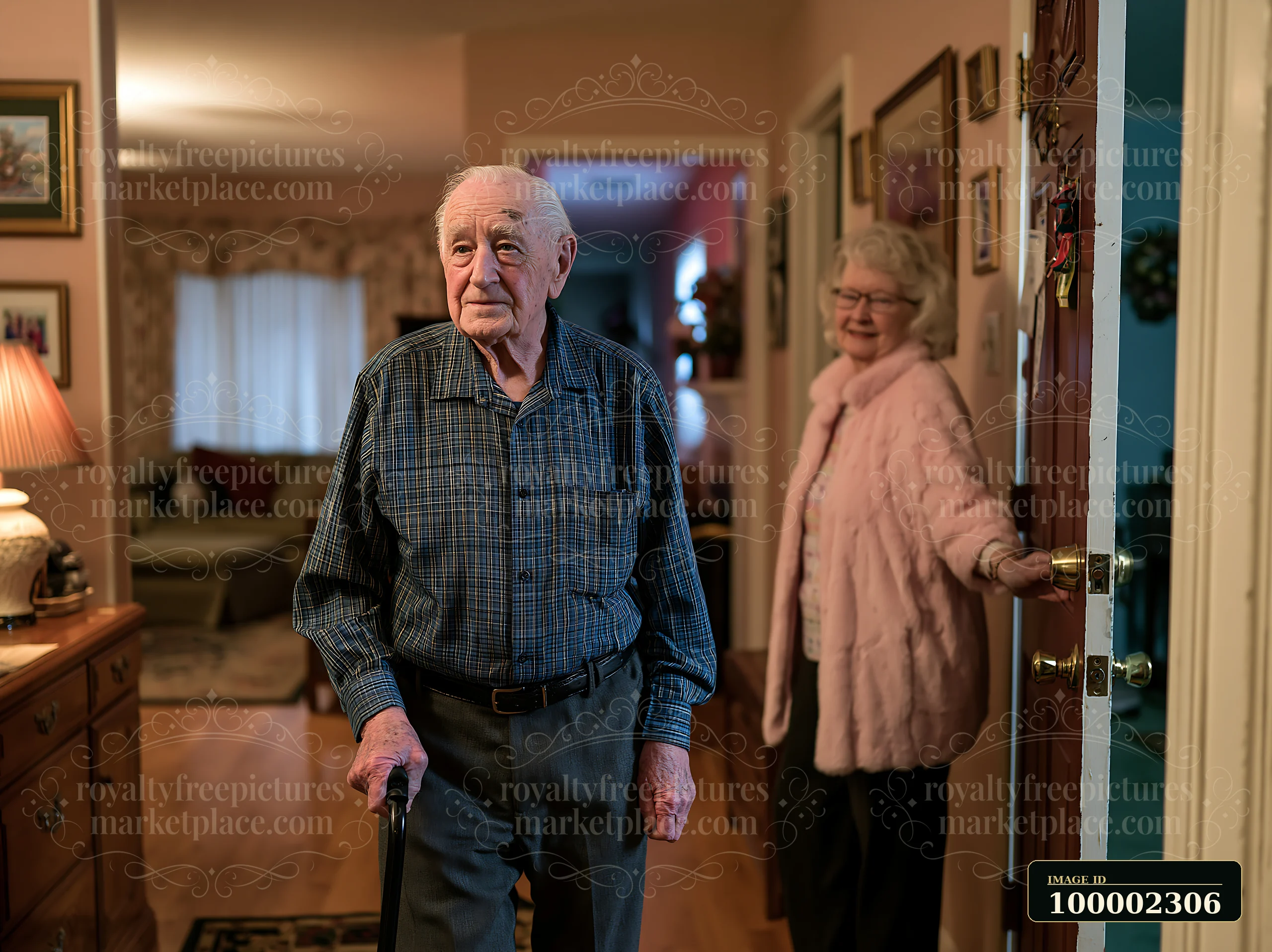 An elderly man stands at the door, using a cane, while a woman smiles softly behind him.
