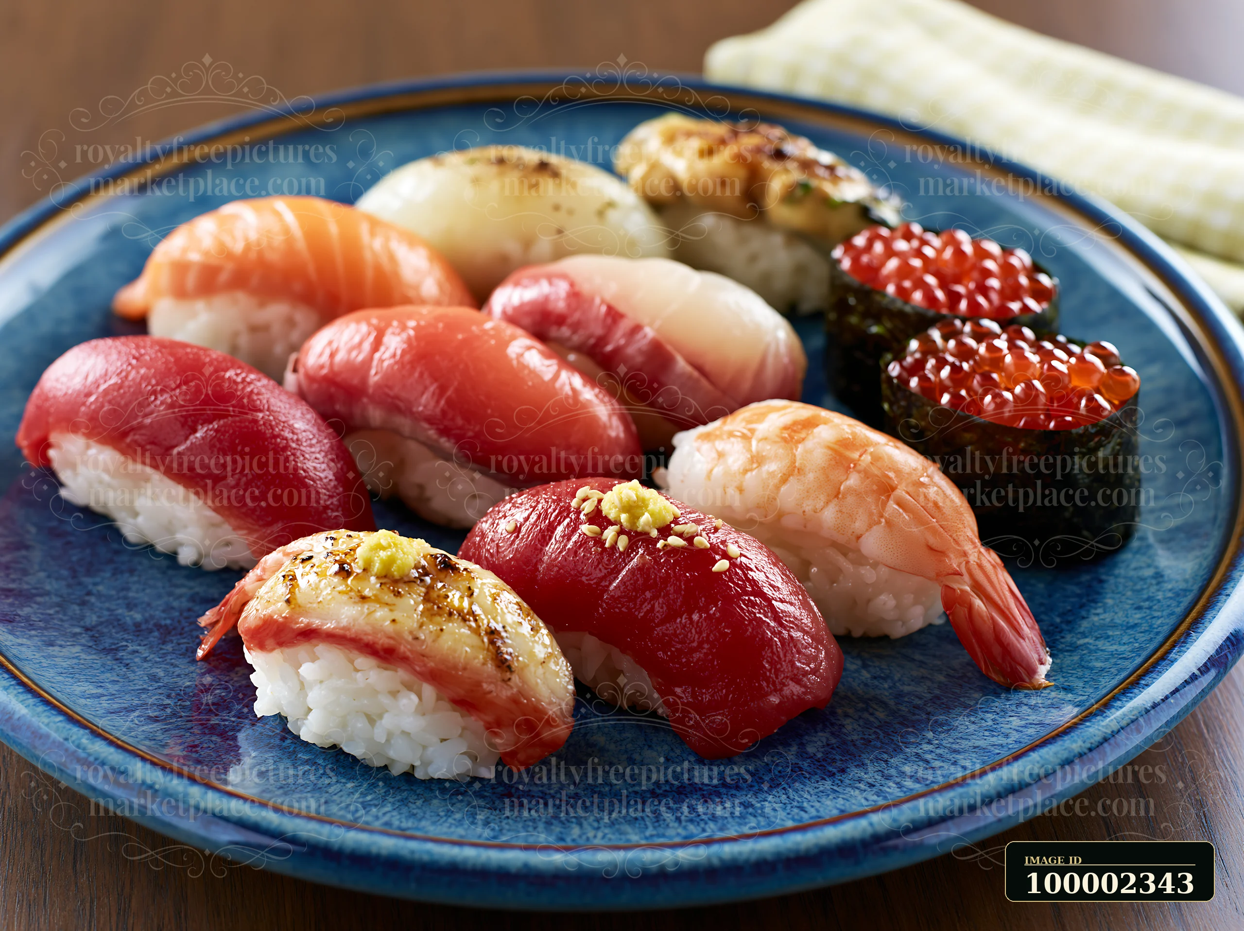 This close-up showcases a variety of sushi pieces on a blue plate.