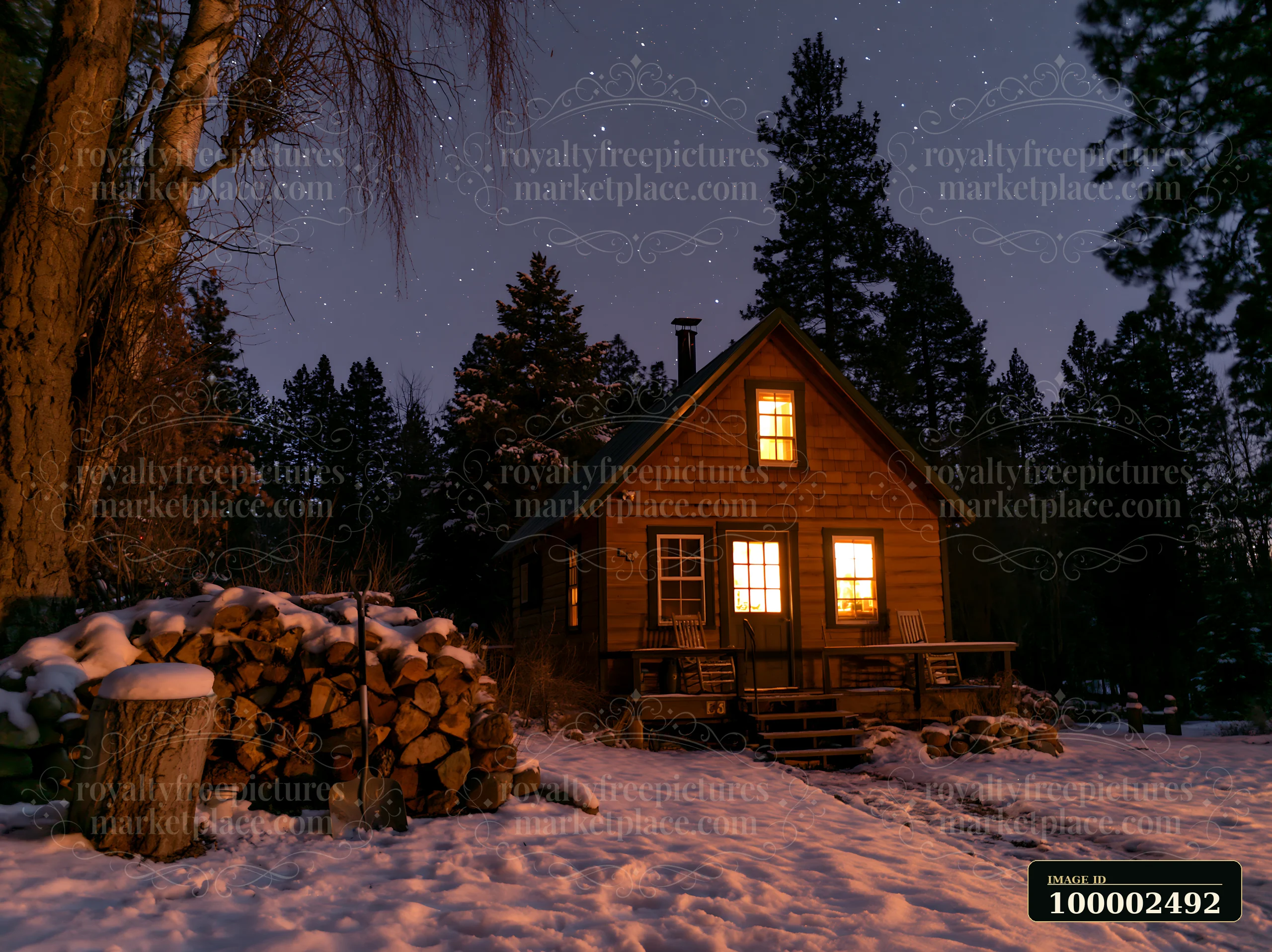 A wooden home is set against a winter night sky filled with stars.