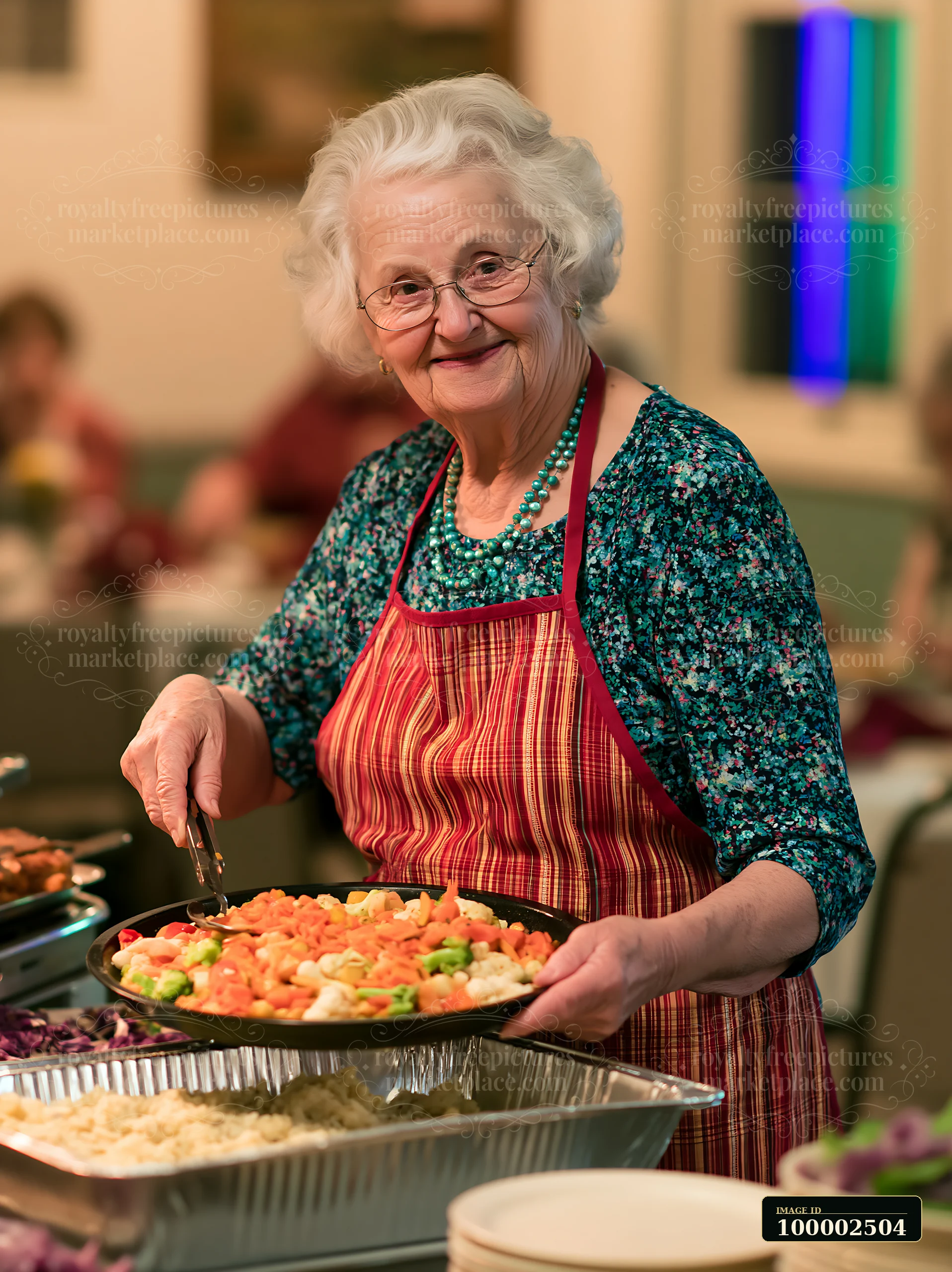 A woman serves food at a church gathering buffet, smiling as she holds a plate of colorful vegetables.