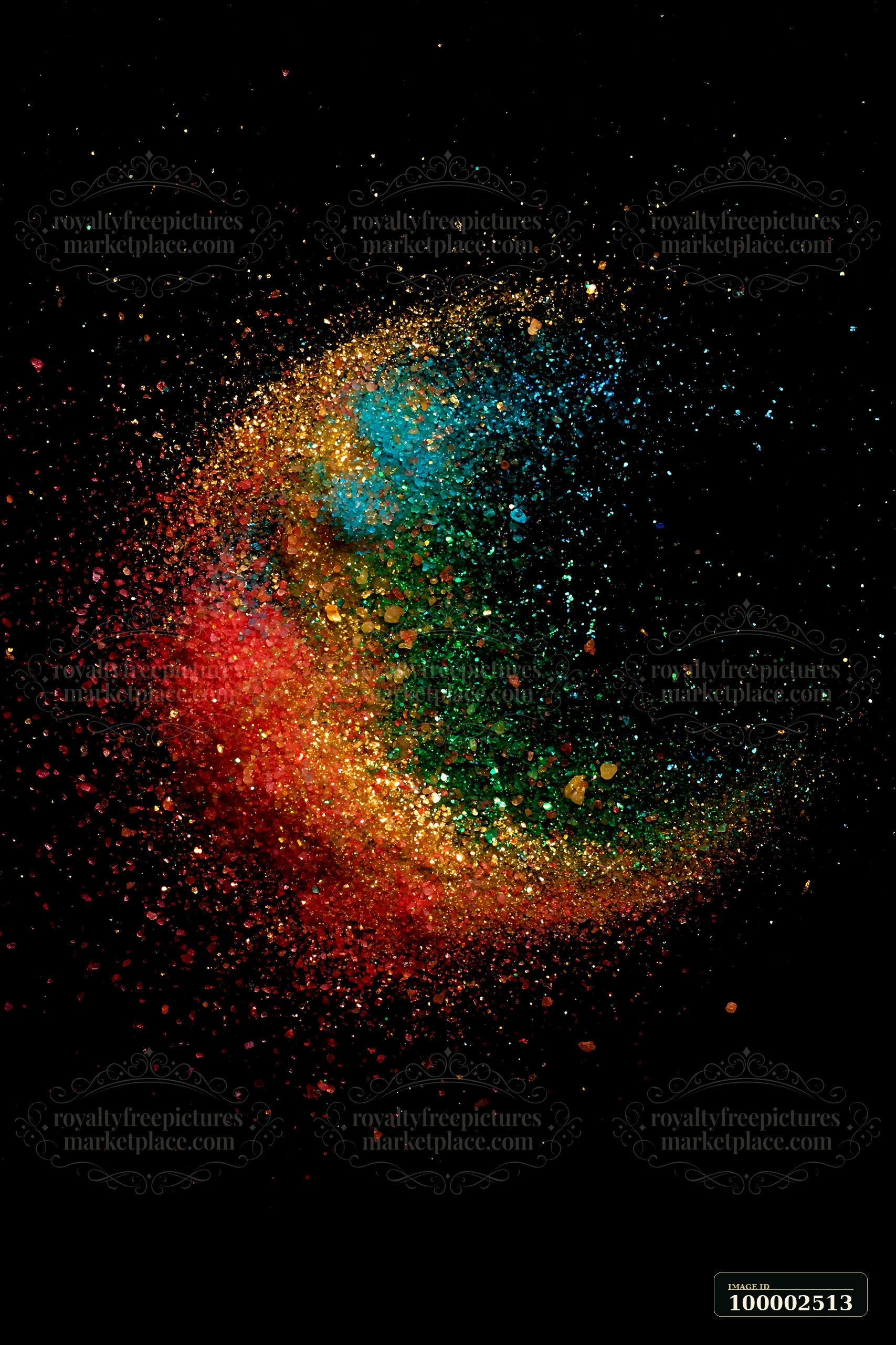 A burst of colors fills the dark background showcasing a colorful salt and glitter abstract pattern.