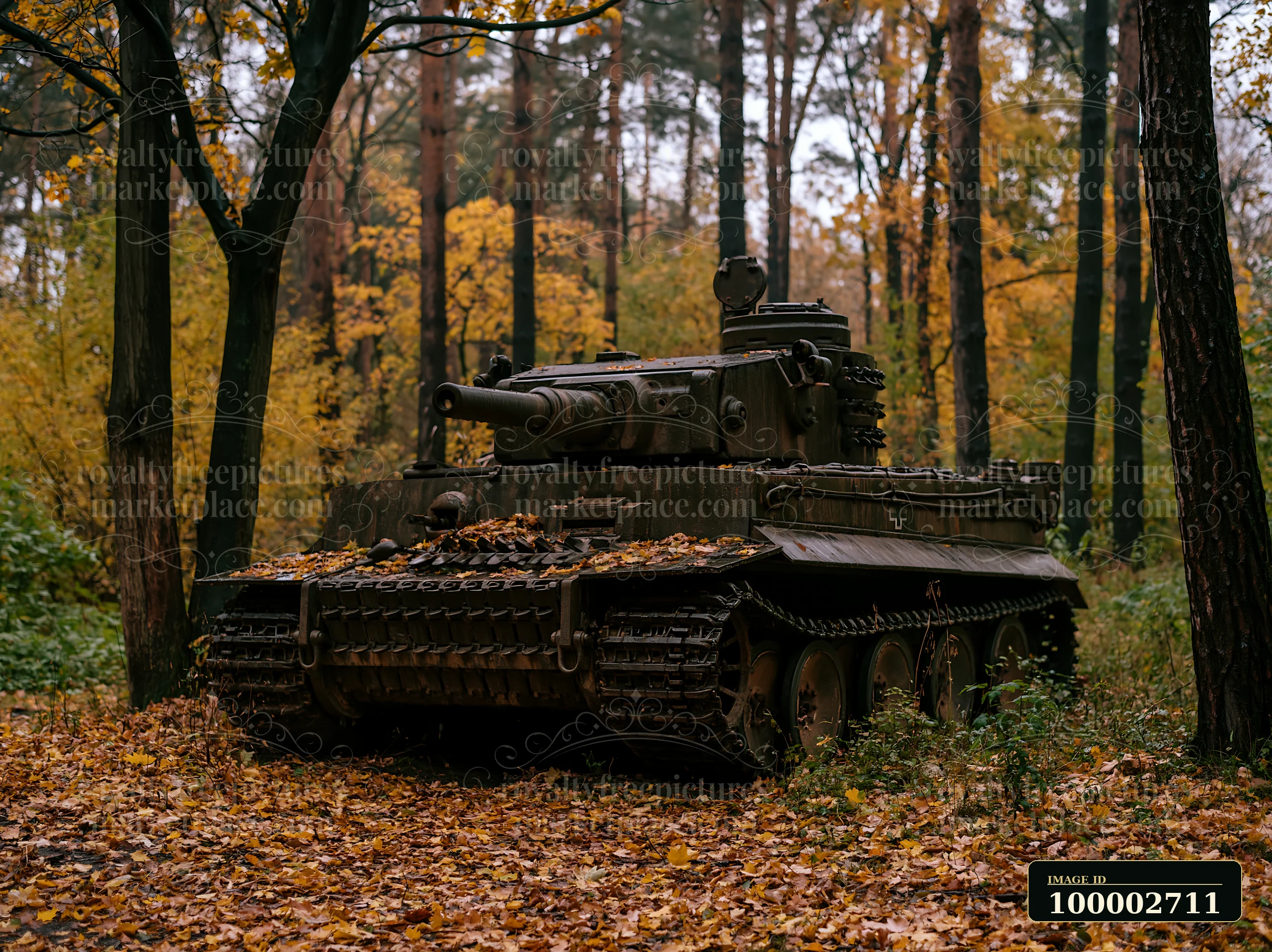 A panzer tank rests among fallen leaves in an autumn forest.