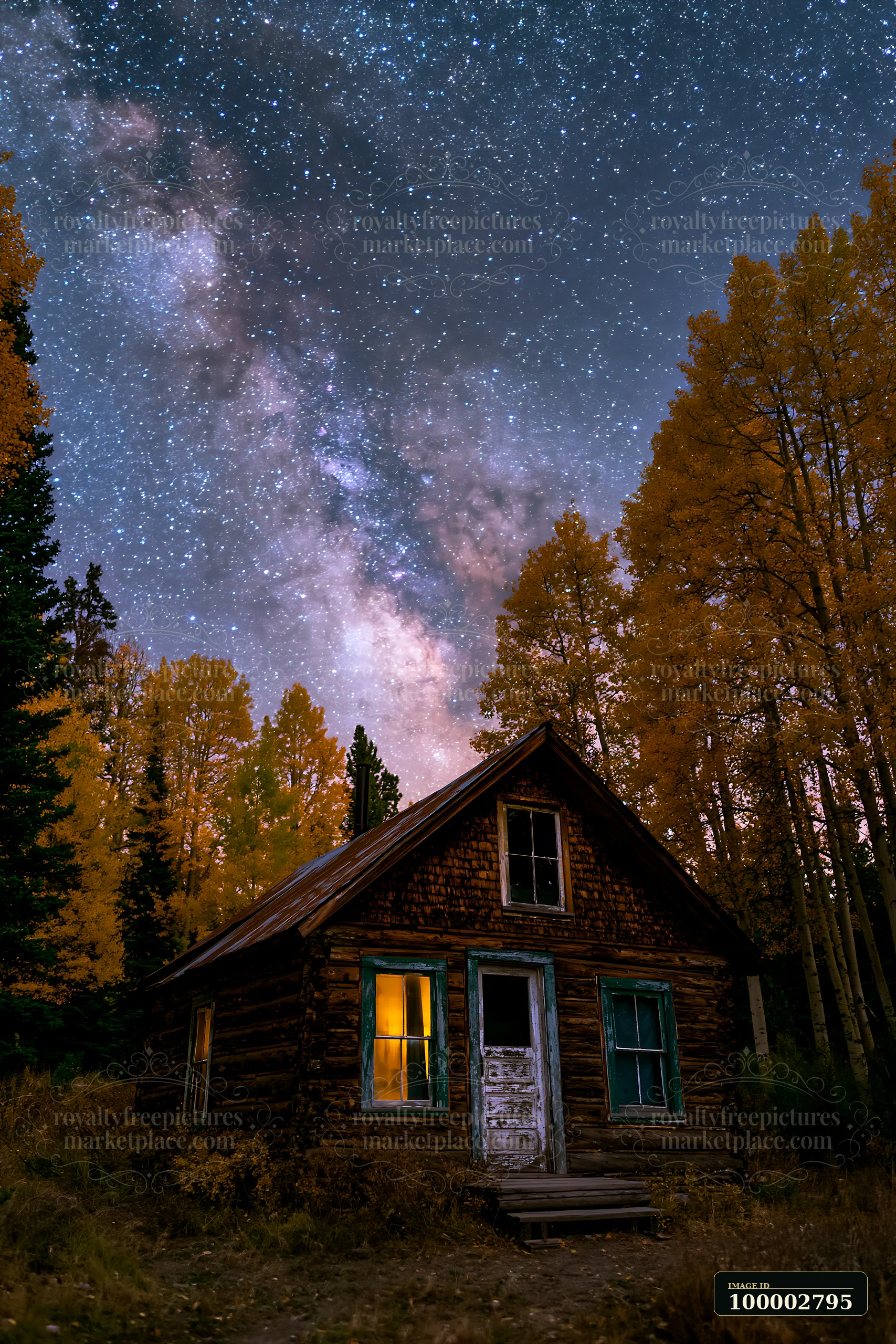 A cozy cabin stands in a valley, illuminated from within, surrounded by tall trees and a clear night sky filled with stars and the Milky Way.
