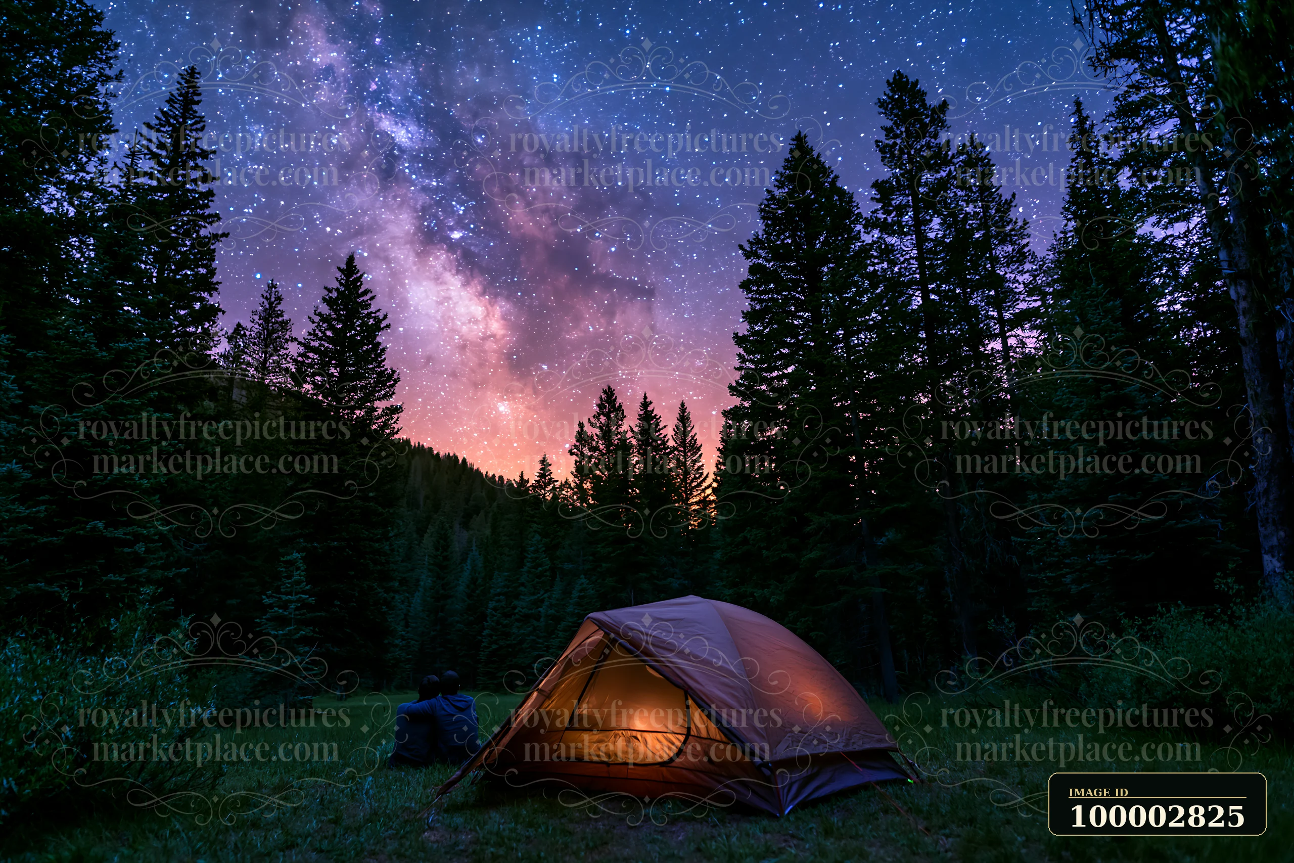 A couple viewing the Milky Way from a forest clearing relaxes near a lit tent in a wooded area.