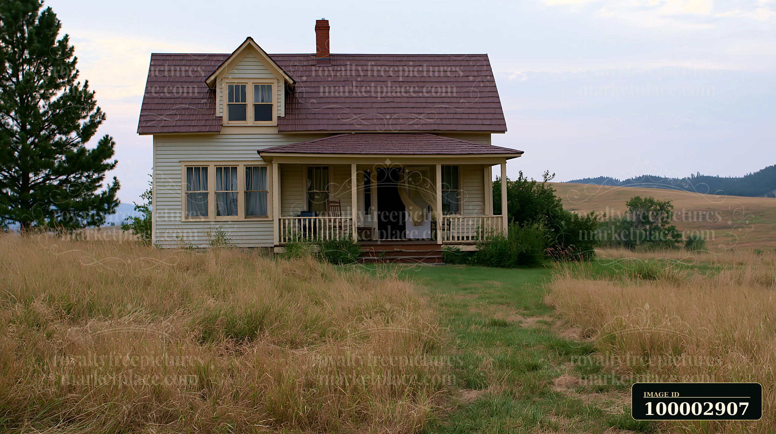 A country house with open front door sits in a grassy field surrounded by tall grass and trees.
