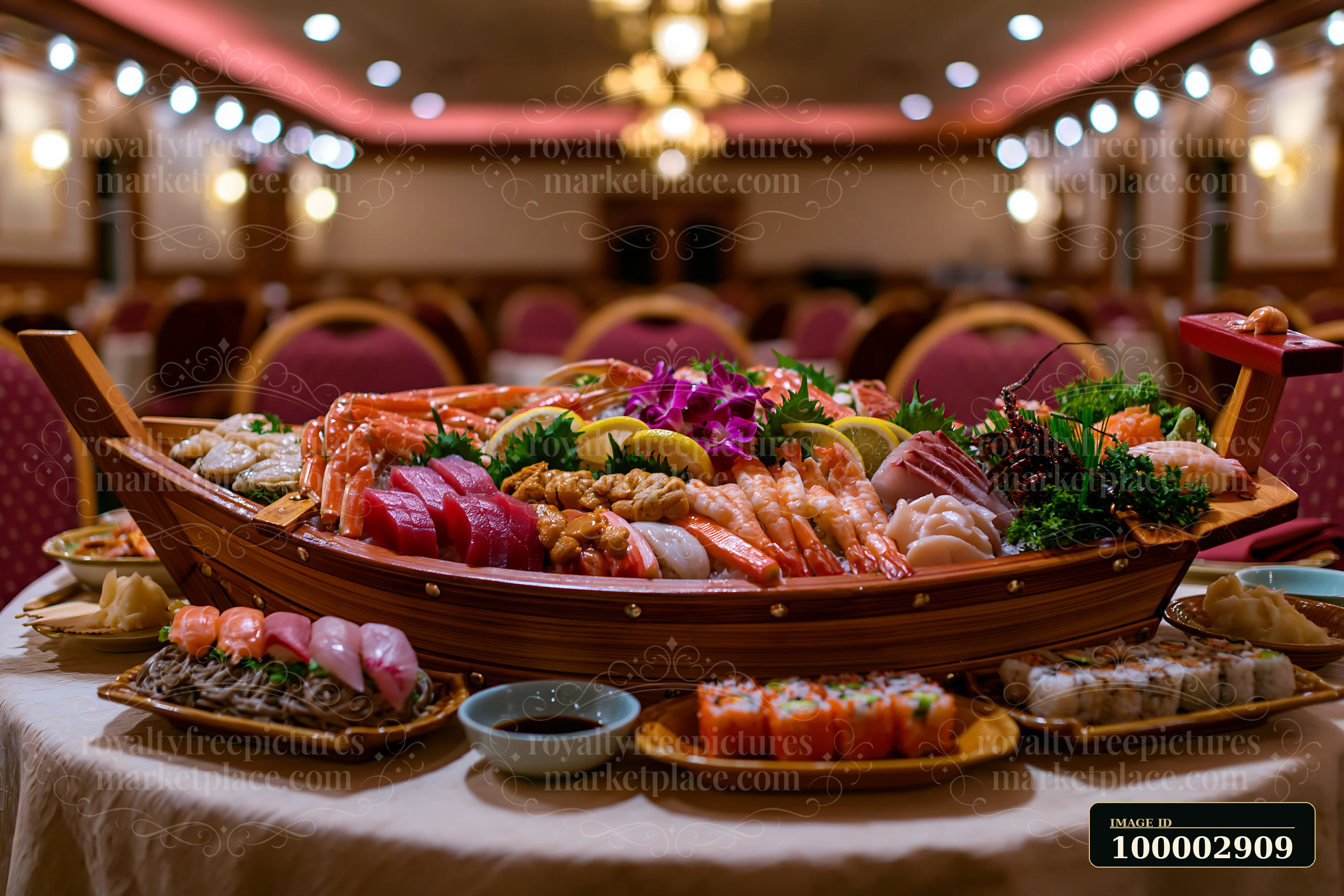 A large wooden sushi boat filled with various seafood types sits on a round table in a well-lit restaurant.
