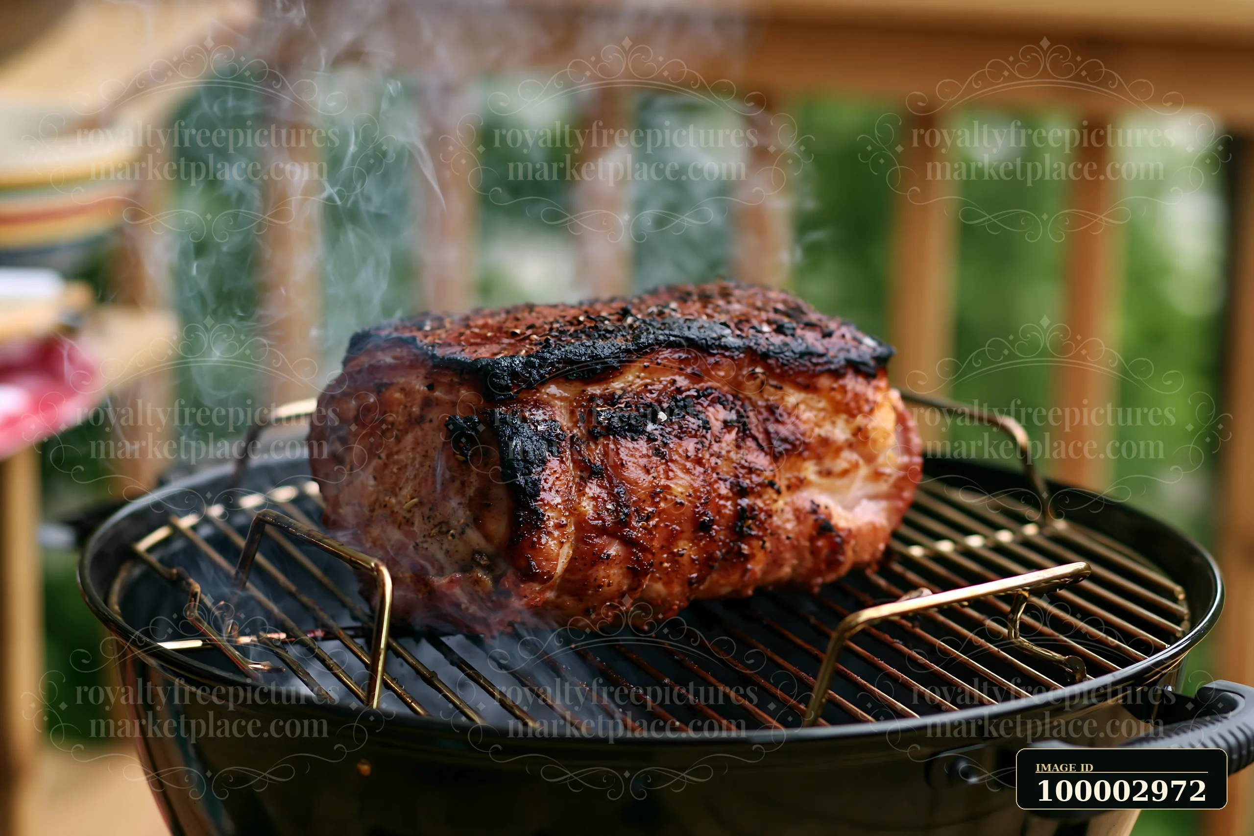 Smoke rises from a barbecue grill featuring a large roast pork.