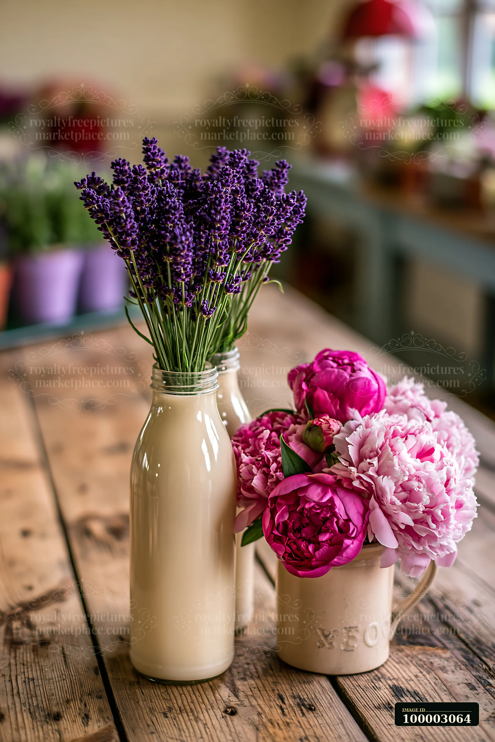 Milk bottles and flowers on a market table create a vibrant scene.