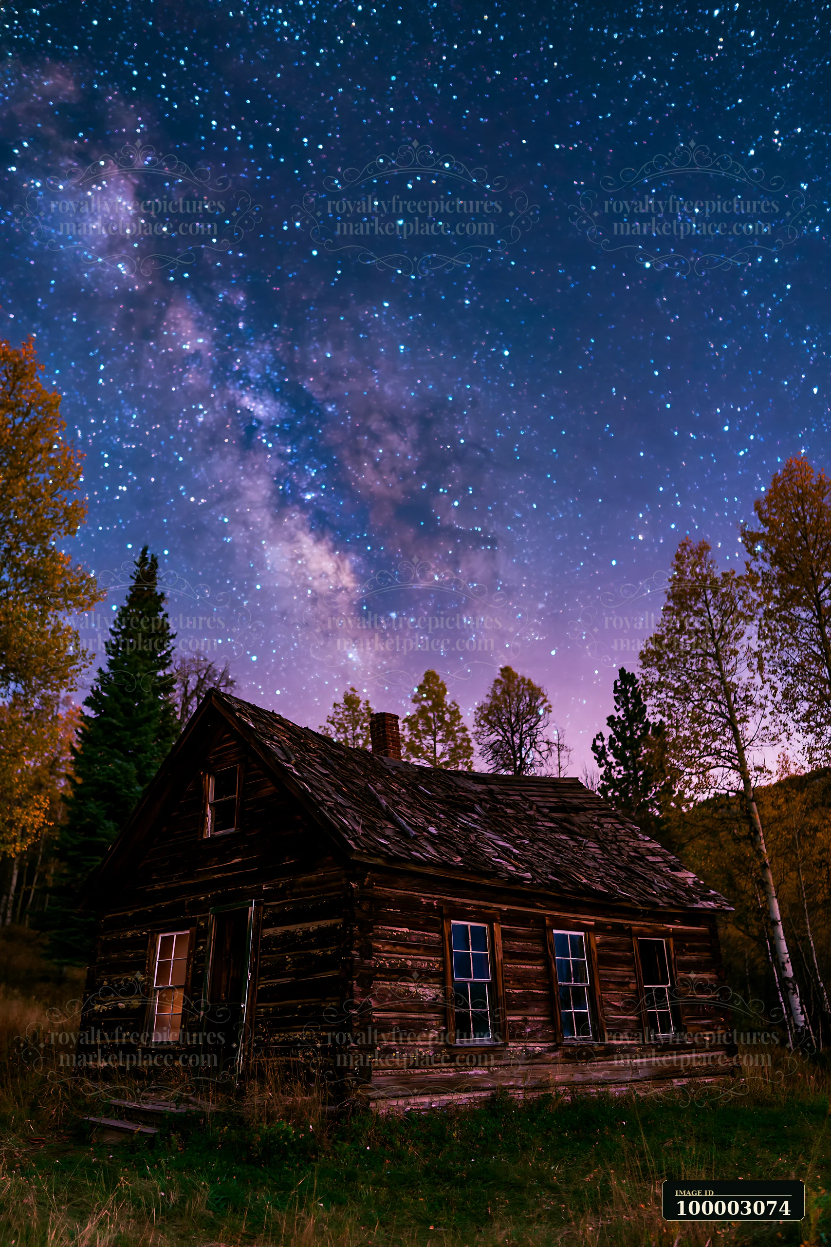 A wooden cabin stands in a valley under stars with the Milky Way clearly visible.