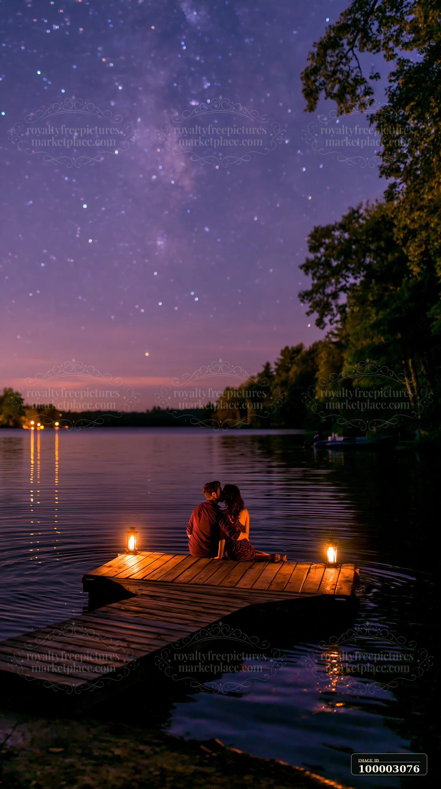 A couple kissing on a dock under stars enjoys a quiet moment by the water.