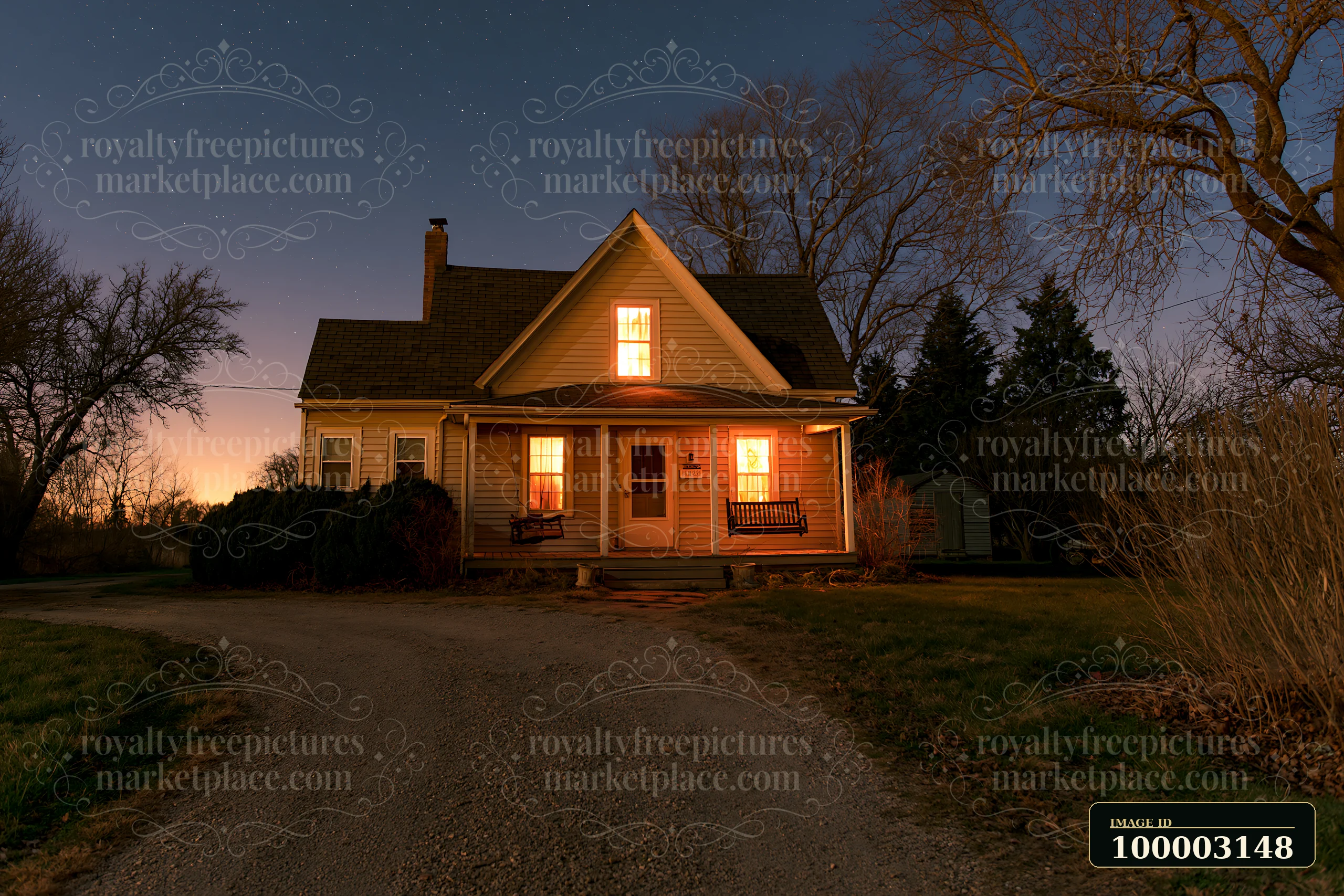 A house with porch swing under starry sky shows a peaceful evening scene with warm lights glowing from the windows.