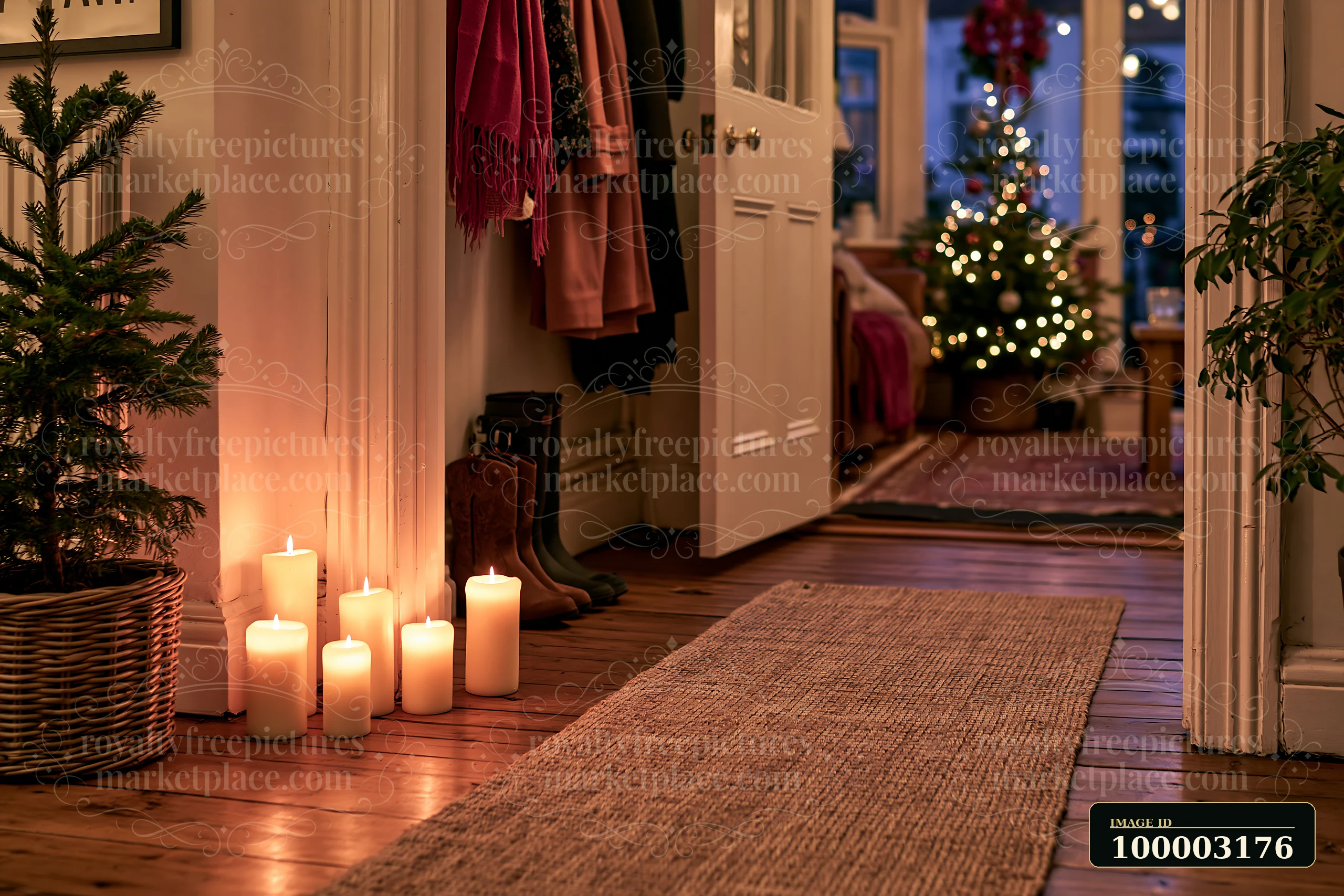 Soft light from glowing candles enhances the warm atmosphere in a Christmas living room.