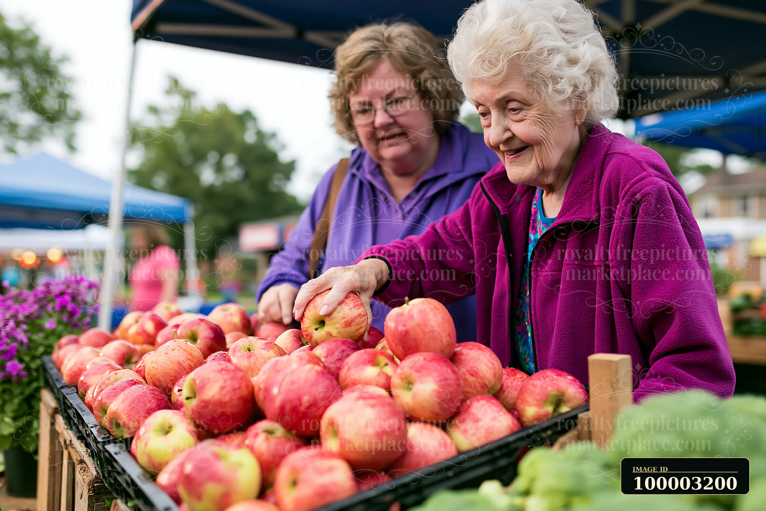 An elderly woman with dementia participates in daily activities at a market, selecting apples while being assisted by another woman.