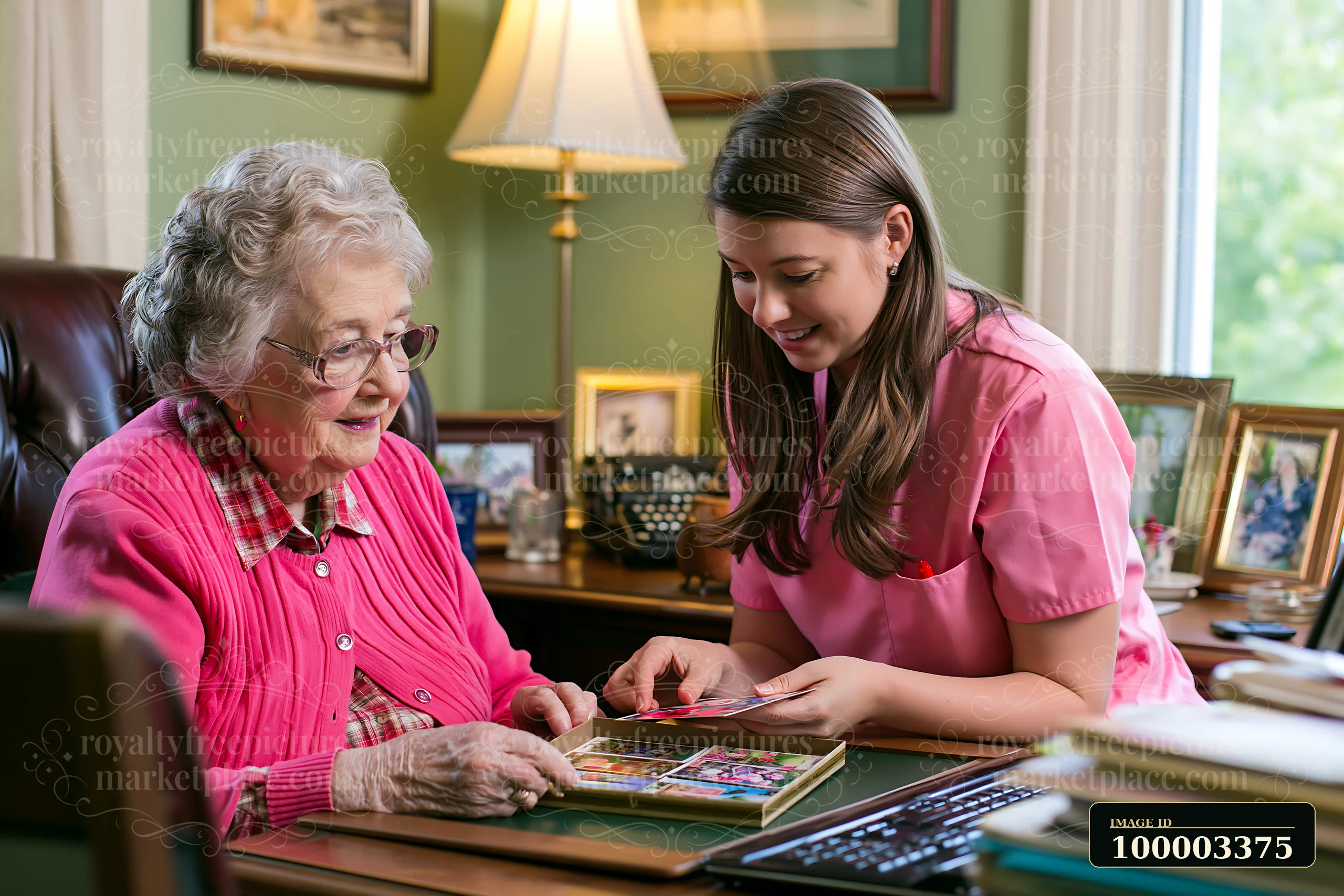 A caregiver providing companionship to senior dementia patient engages in a shared activity.
