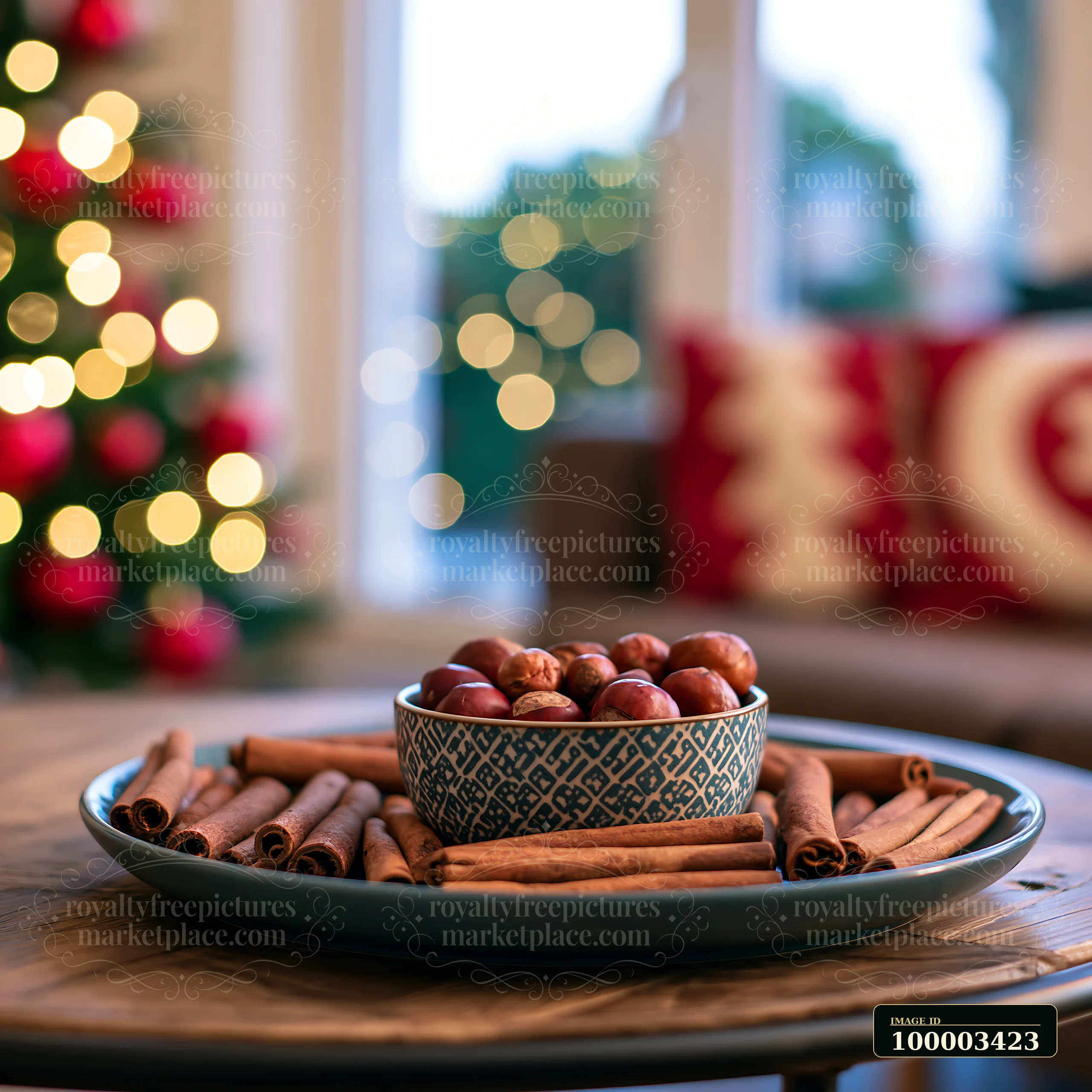 A cozy living room displays a tray with cinnamon sticks and nuts, set against a decorated Christmas tree and twinkling lights.