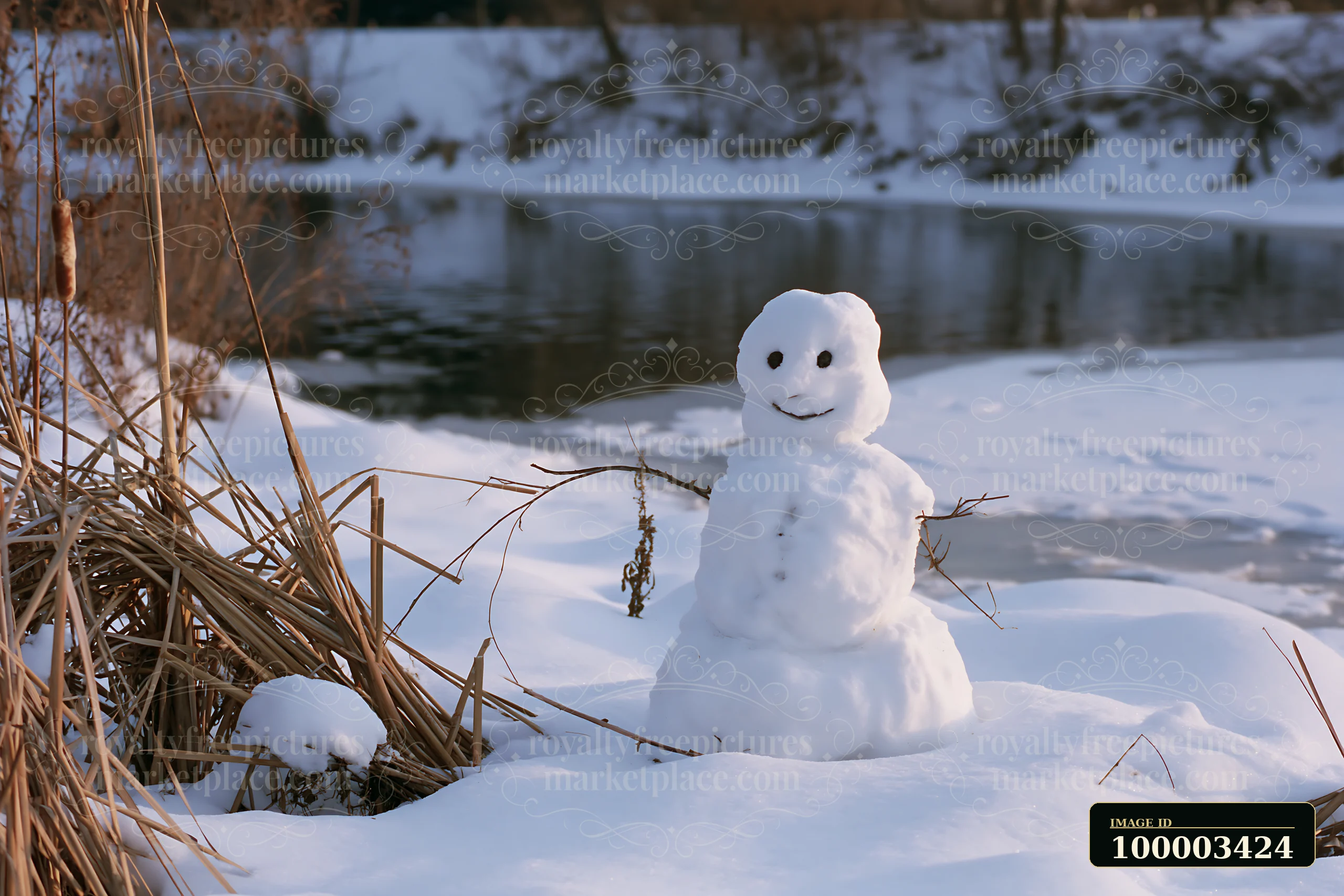 A snowman surrounded by snowdrifts stands by the edge of a frozen river.