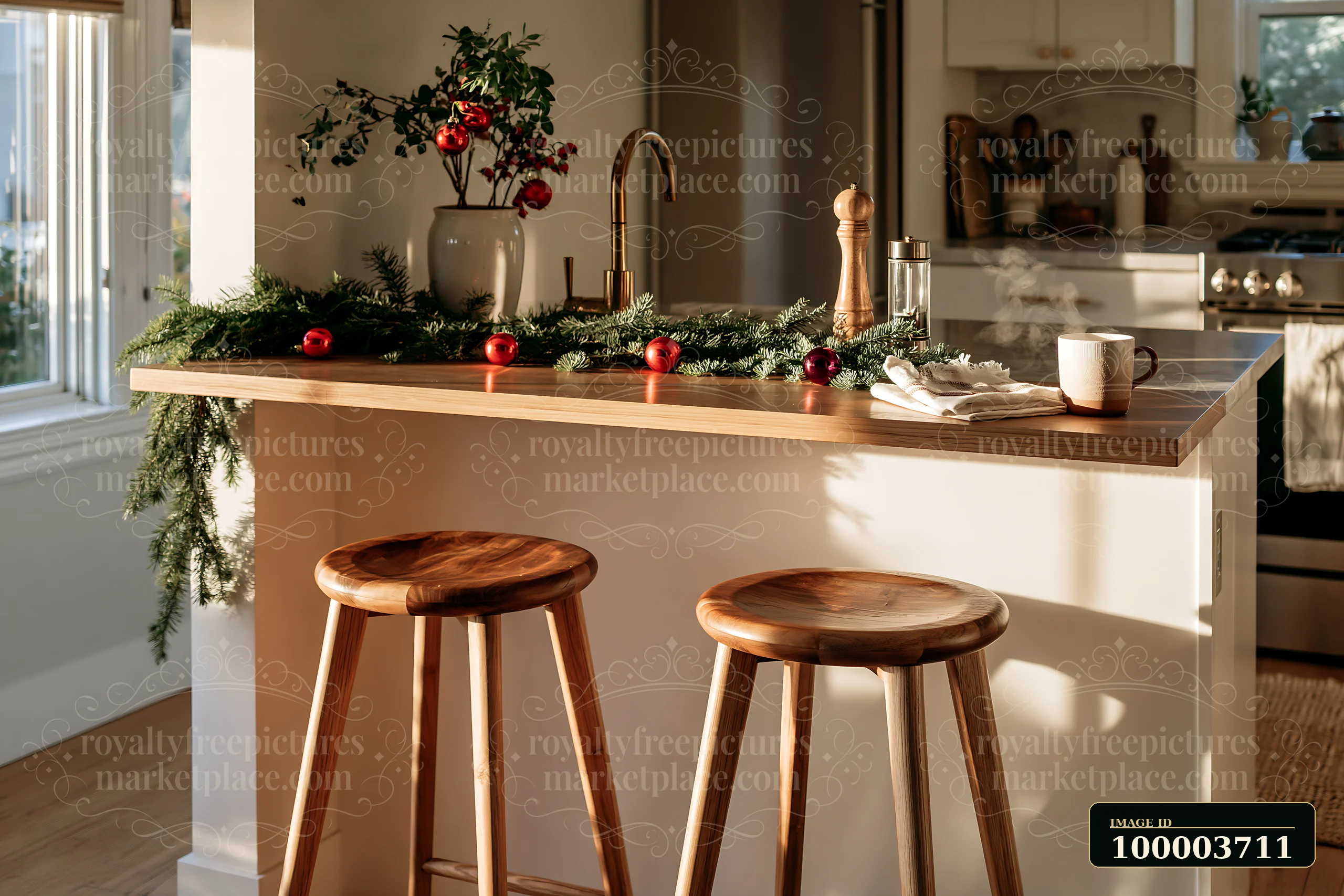 The kitchen features a breakfast bar adorned with holiday decorations, showcasing a wooden surface and glowing sunlight.