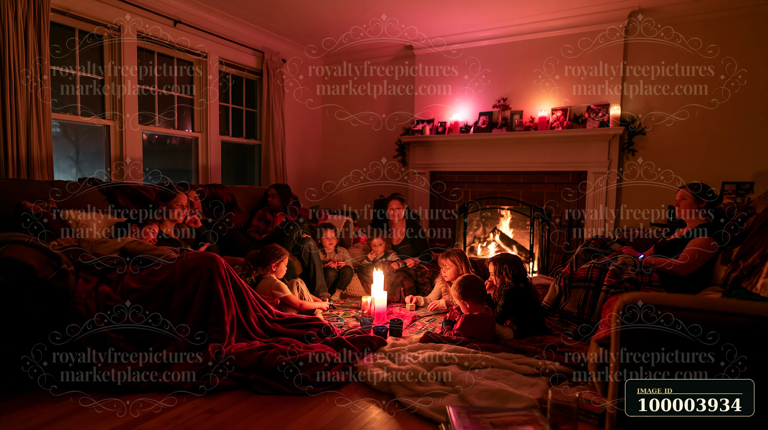 Adults and children gather on sofas and the floor around a glowing fireplace in a cozy room.